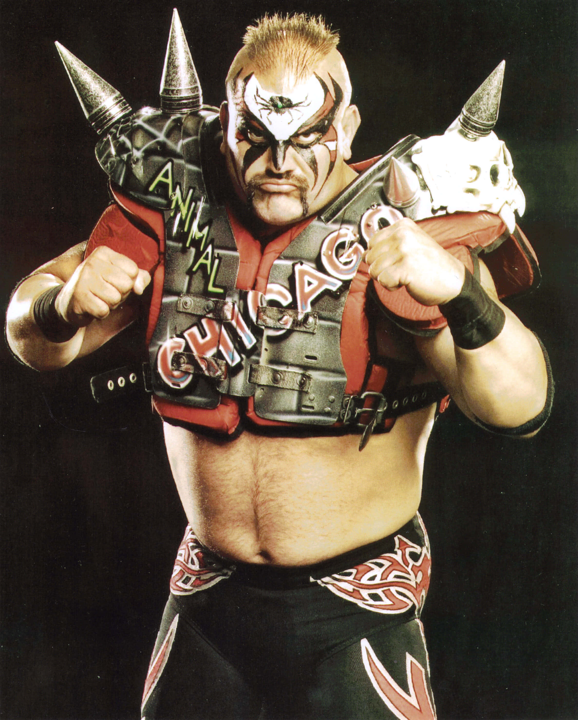 Road Warrior Hawk, spiked shoulder pads, face paint, 2K Phone Wallpaper