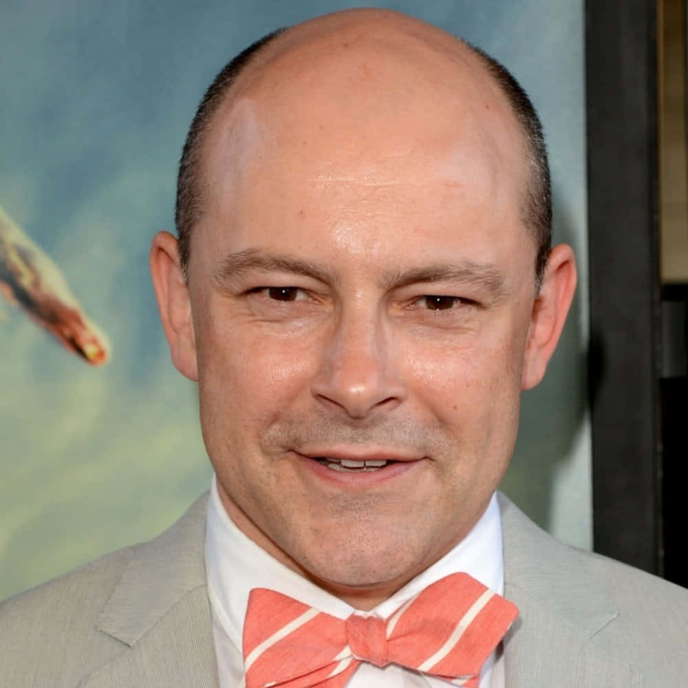 Rob Corddry, gray suit, coral striped bow tie, SD Desktop Wallpaper