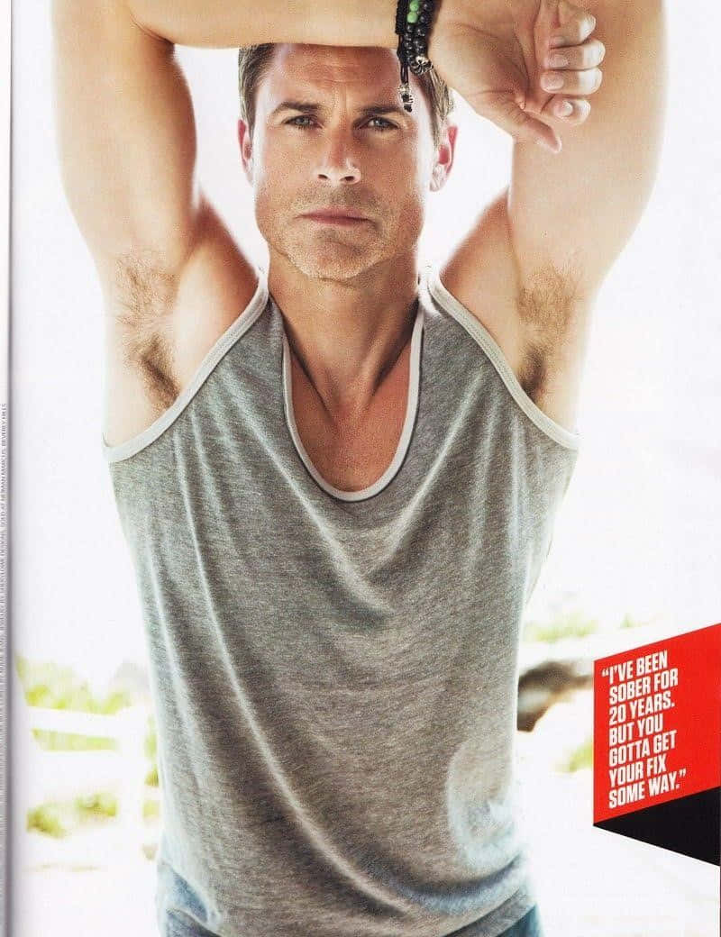 Rob Lowe, gray tank top, bright outdoor backdrop, SD Phone Wallpaper