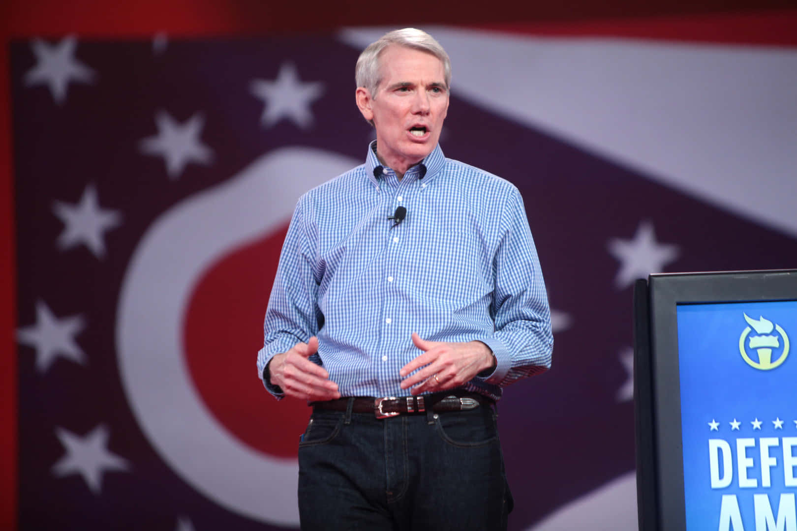 Rob Portman, blue checkered shirt, patriotic star and stripe backdrop, HD Desktop Wallpaper