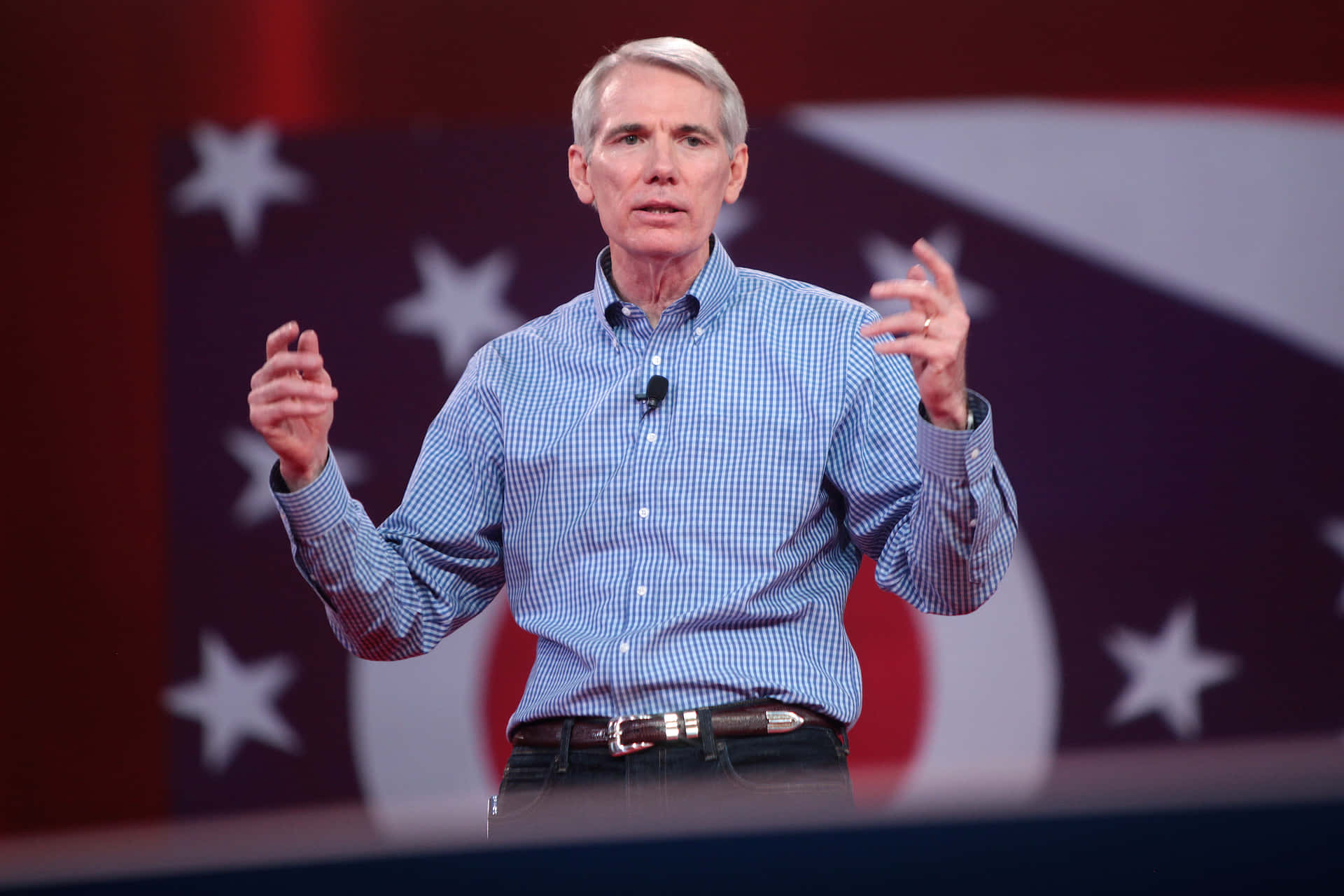 Rob Portman, blue checkered shirt, red white and blue star background, Full HD Desktop Wallpaper