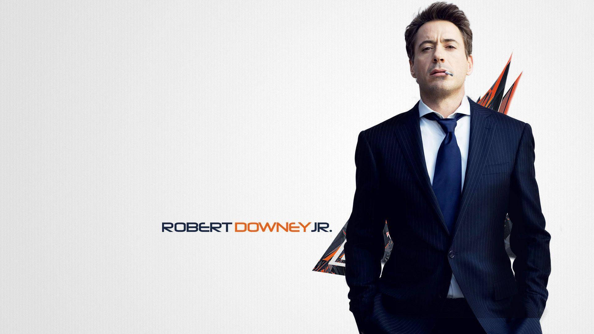 Robert Downey Jr, dark pinstripe suit, confident smirk, Full HD Desktop Wallpaper