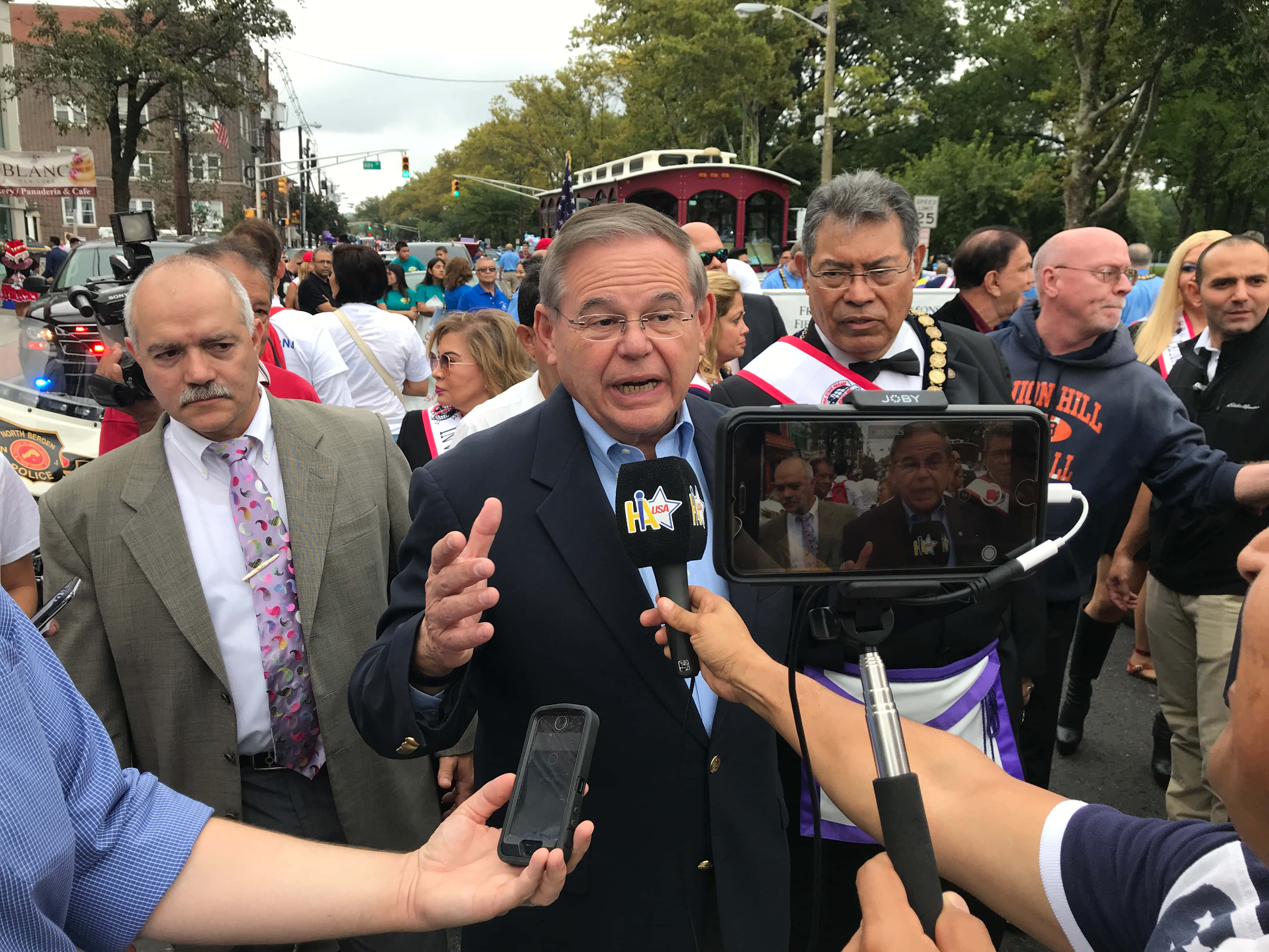 Robert Menendez, suit, crowded outdoor parade, 4K Desktop Wallpaper