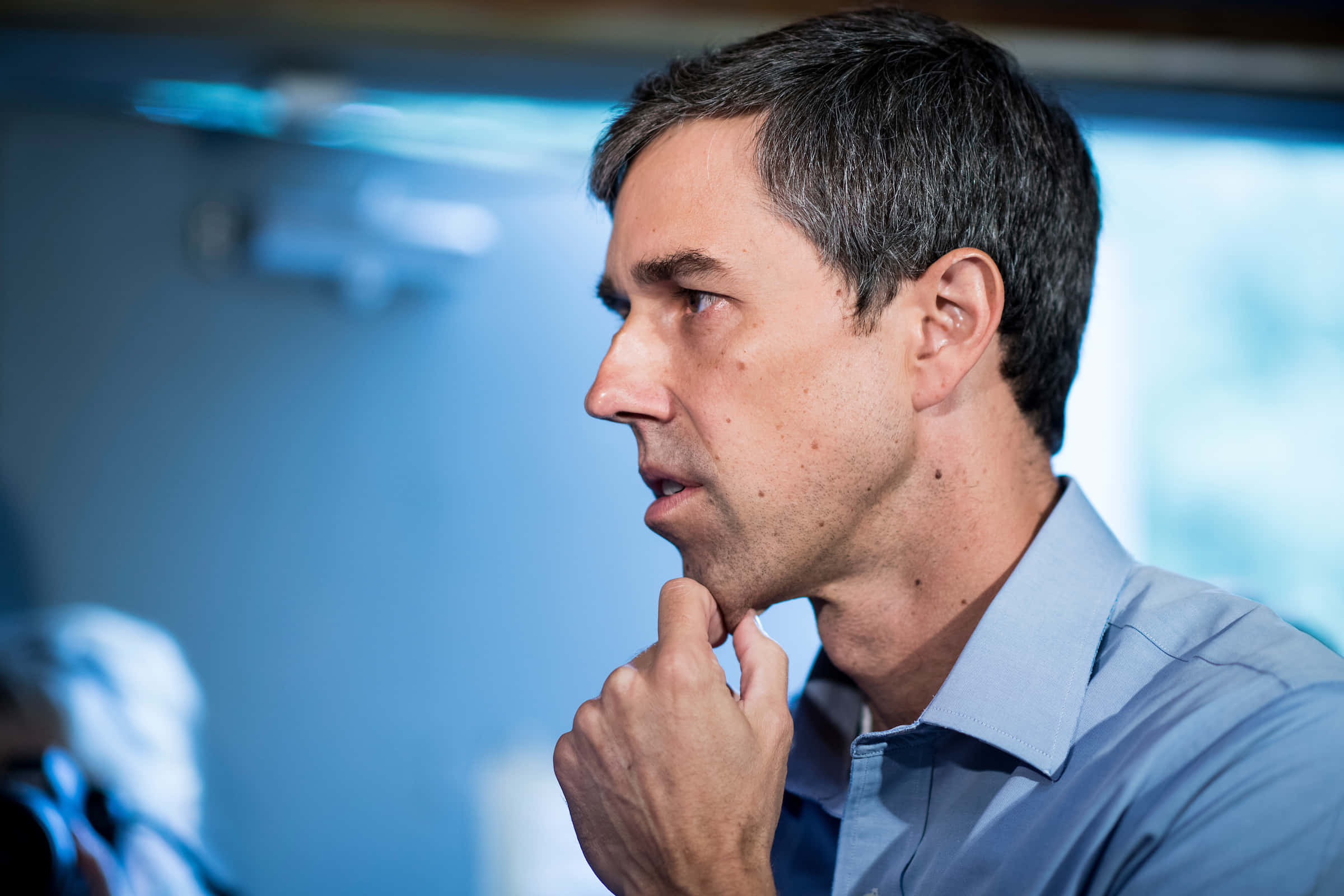 Robert O'rourke, light blue shirt, finger resting on chin, Full HD Desktop Wallpaper
