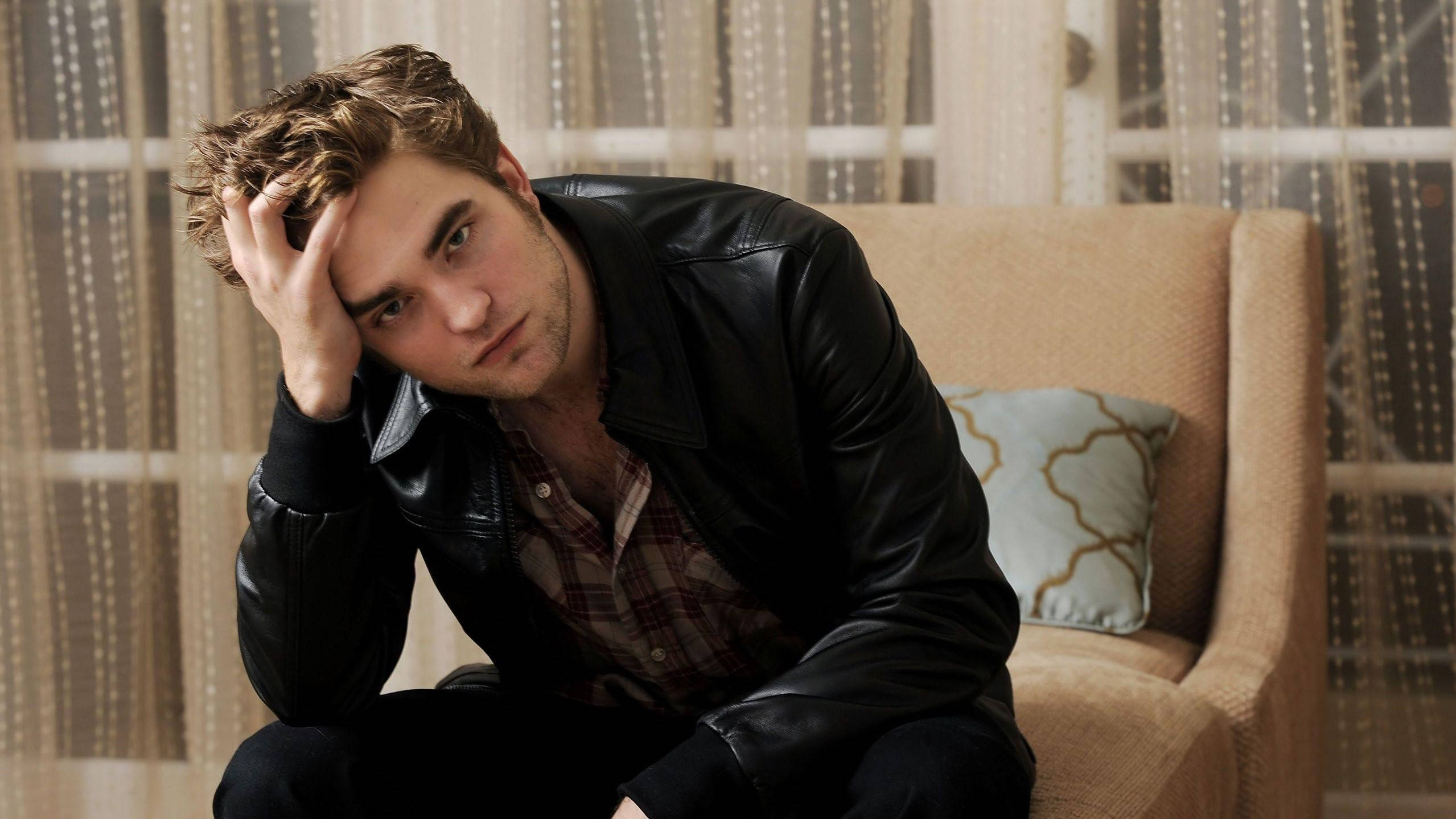Robert Pattinson, black leather jacket, beige armchair, Full HD Desktop Wallpaper