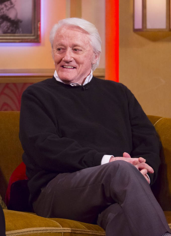 Robert Vaughn, talk show, mustard yellow couch, SD Phone Wallpaper