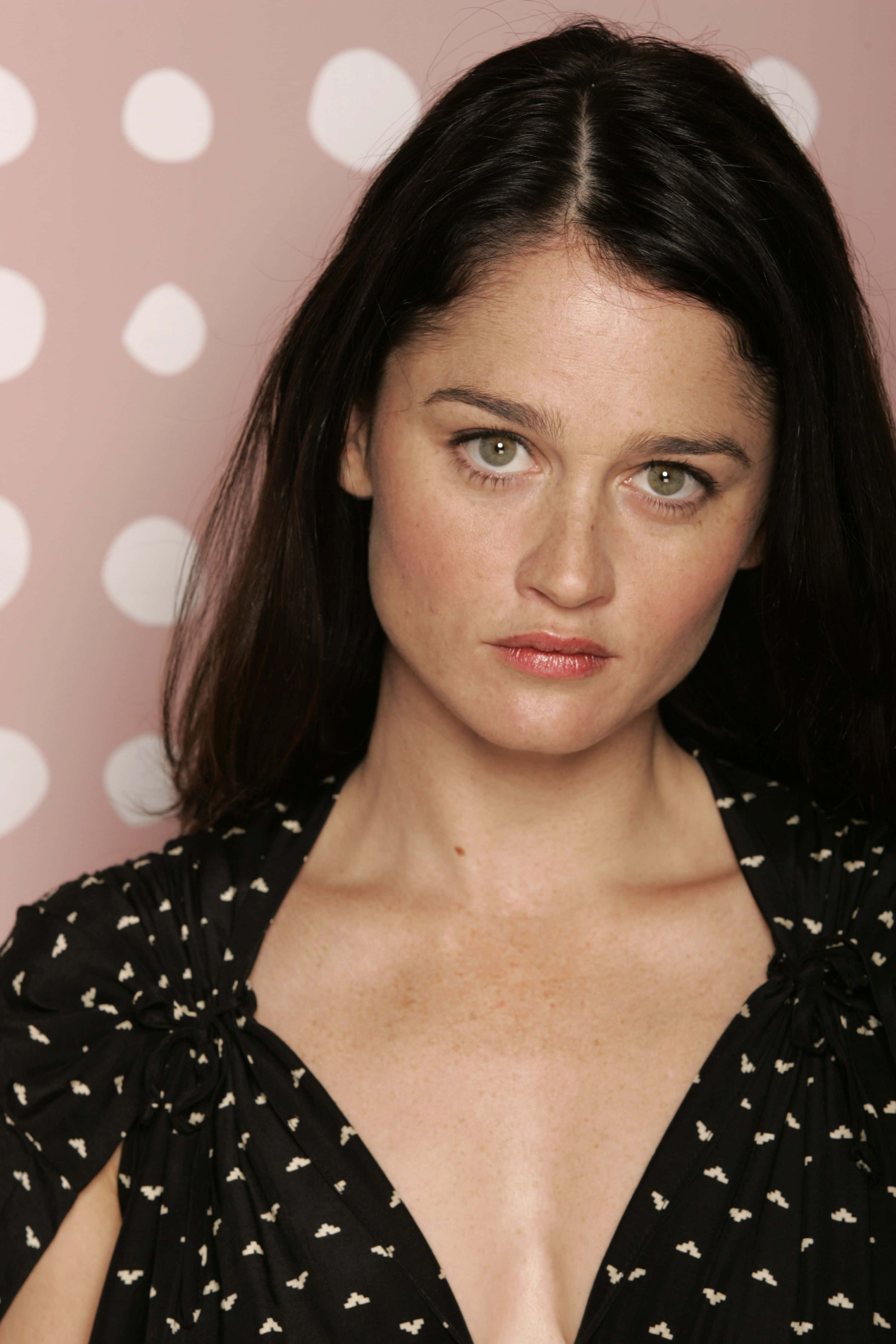 Robin Tunney, pink polka dot background, dark hair, 4K Phone Wallpaper