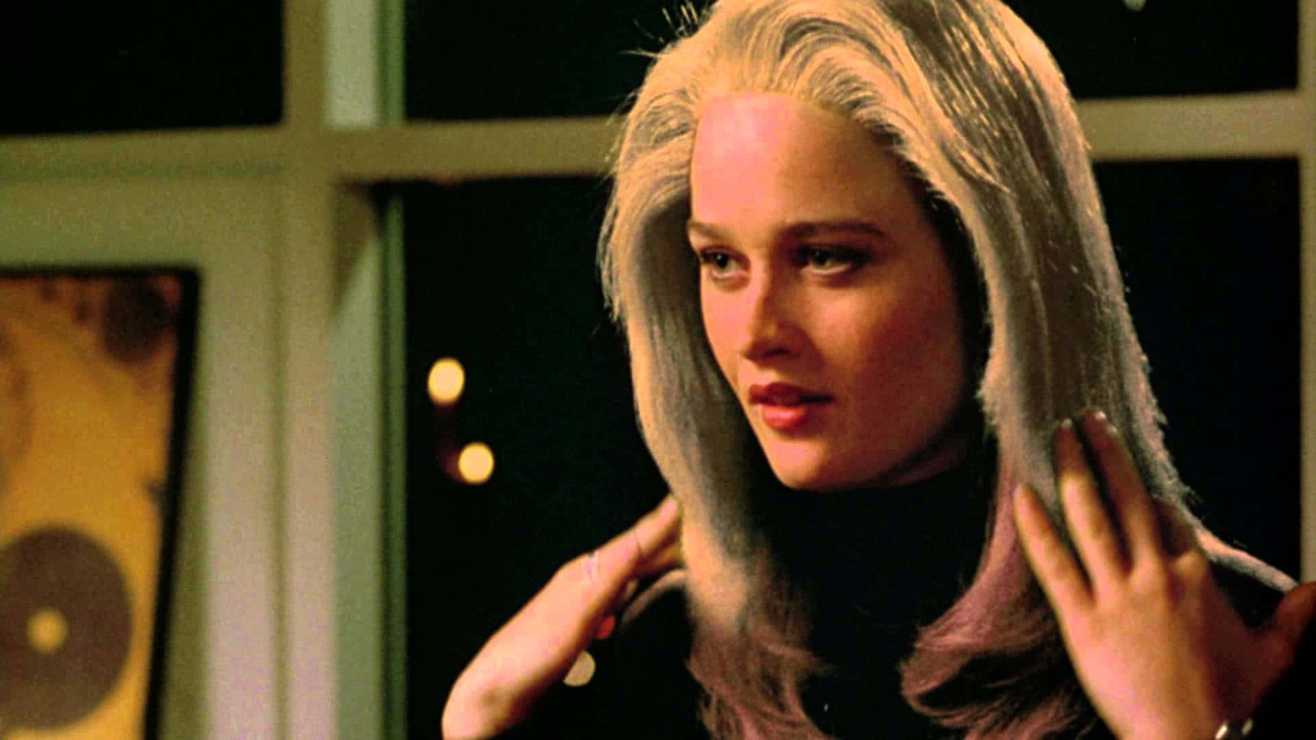 Robin Tunney, long silver hair, warmly lit indoor scene, Full HD Desktop Wallpaper