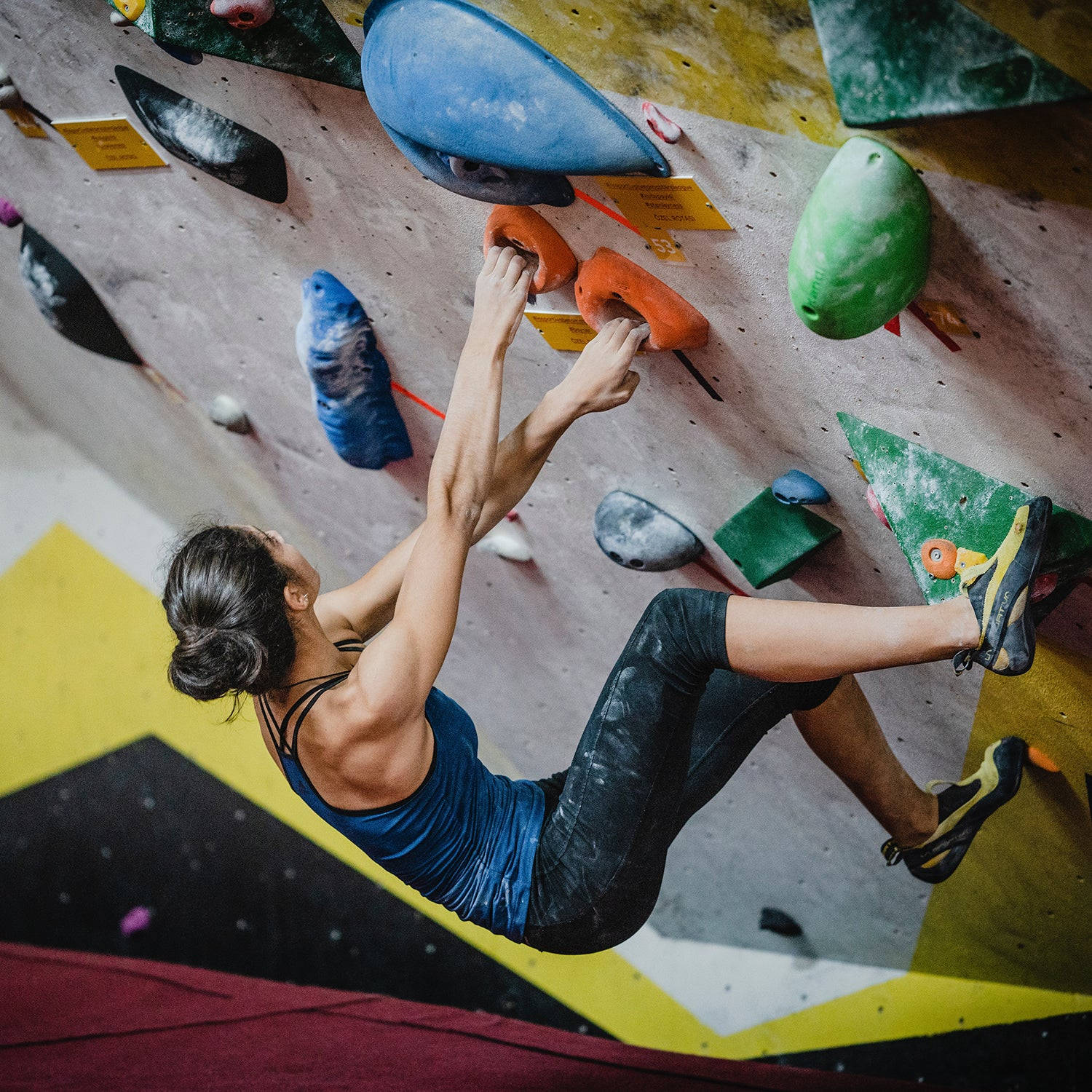 girl climbing wall rocks, blue top, colorful indoor rock wall, HD Desktop Wallpaper