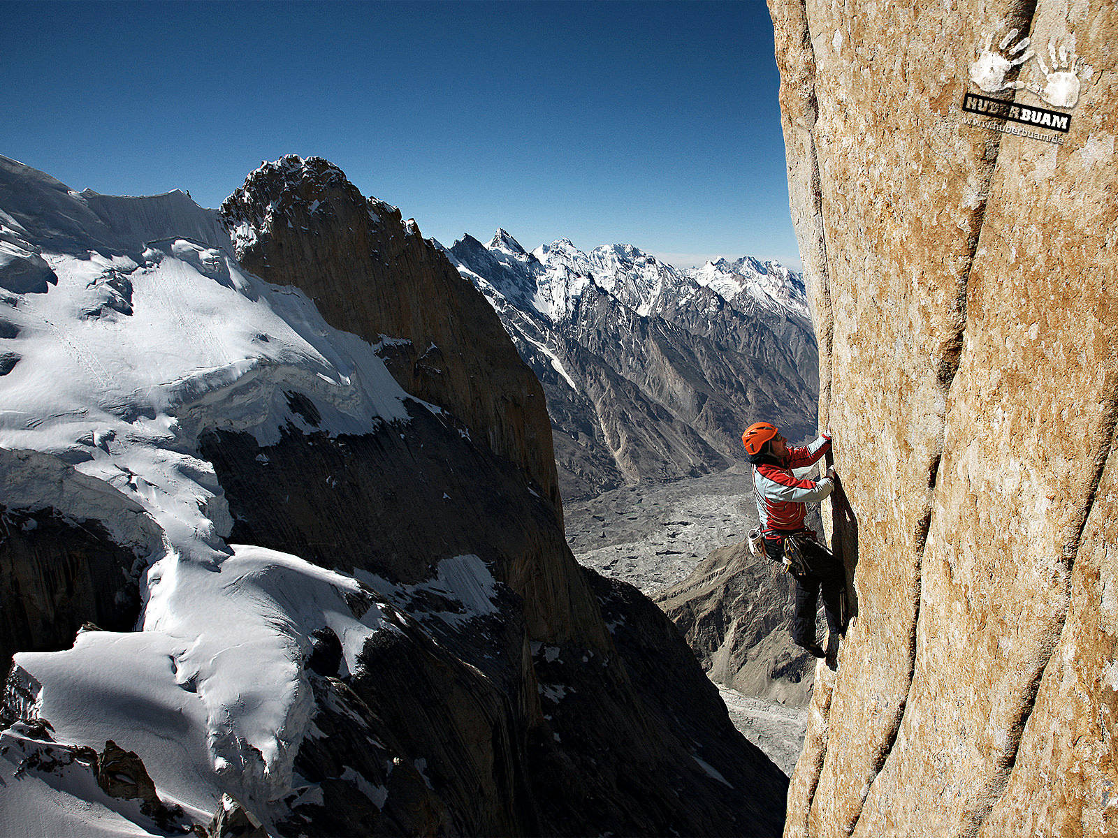 red gear, sunlit rock face, snow-capped peaks, HD Desktop Wallpaper