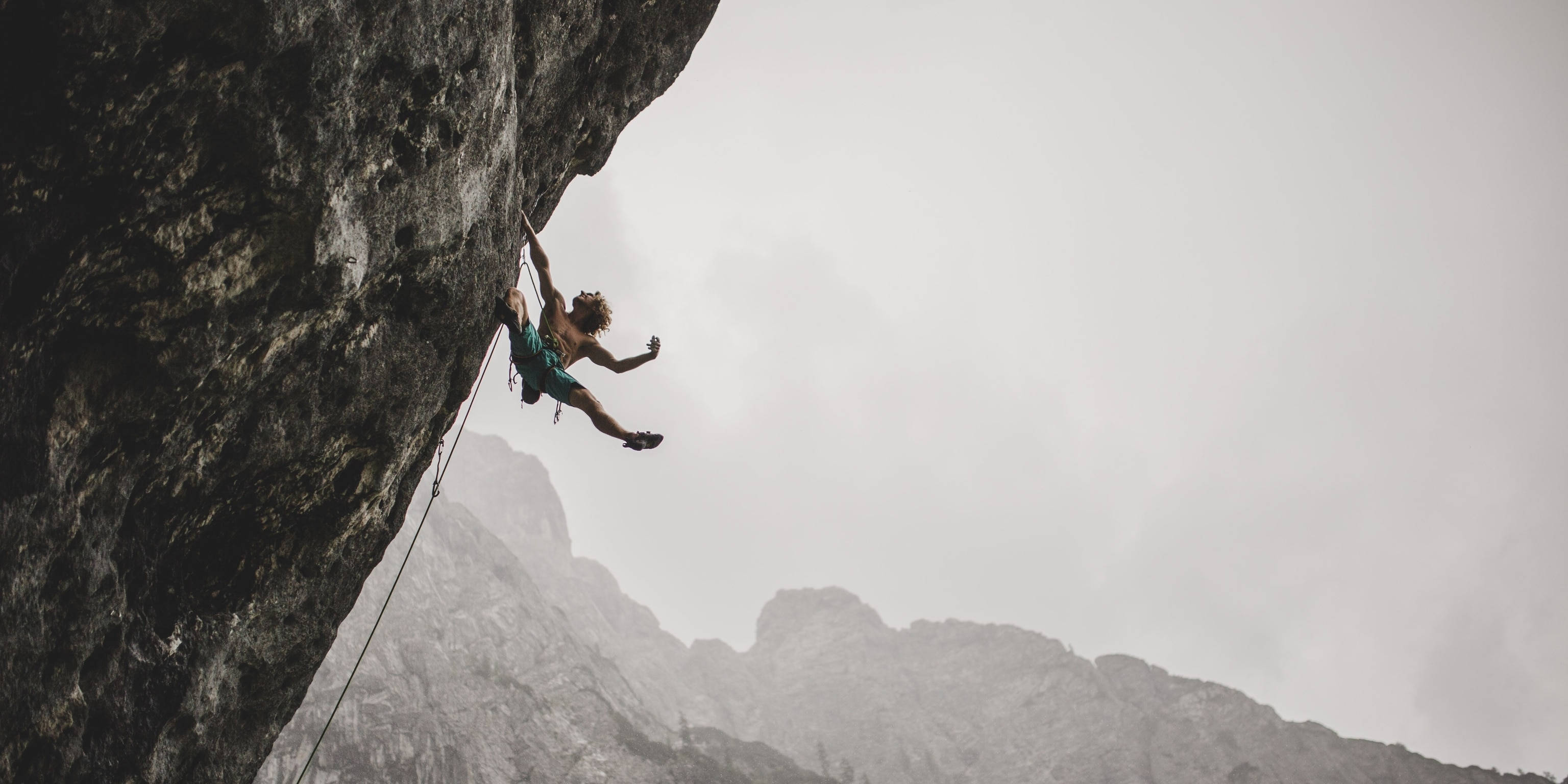topless man, rock climbing, stormy weather, 2K Desktop Wallpaper