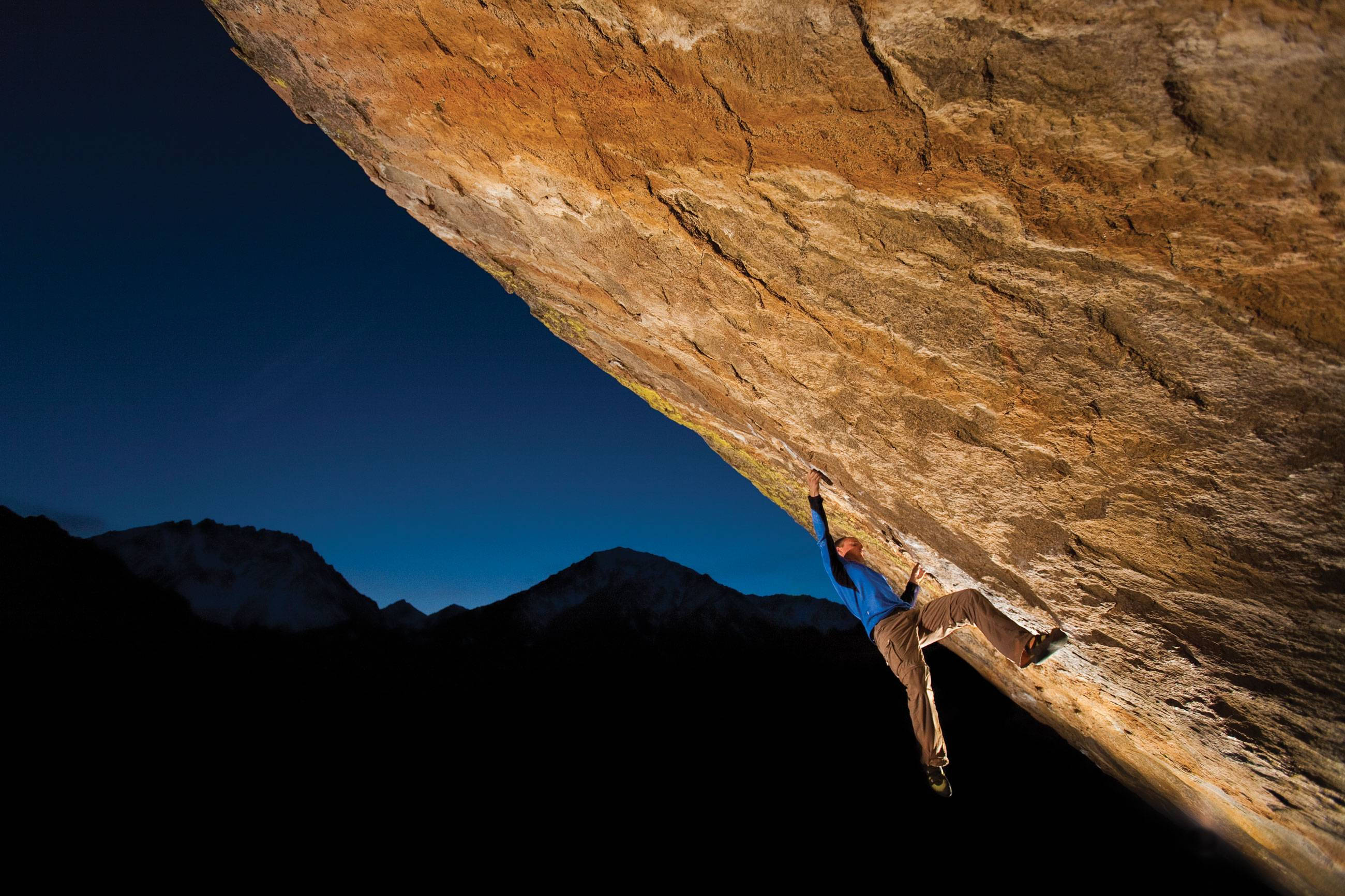 man, huge rock, night, 2K Desktop Wallpaper