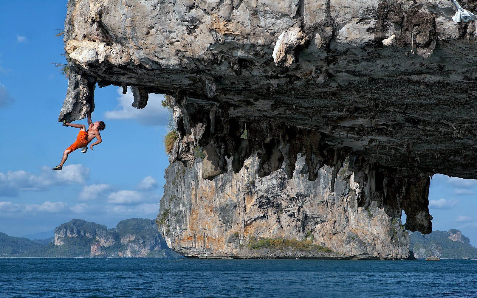 man rock climbing, orange shorts, limestone cliff, HD Desktop Wallpaper