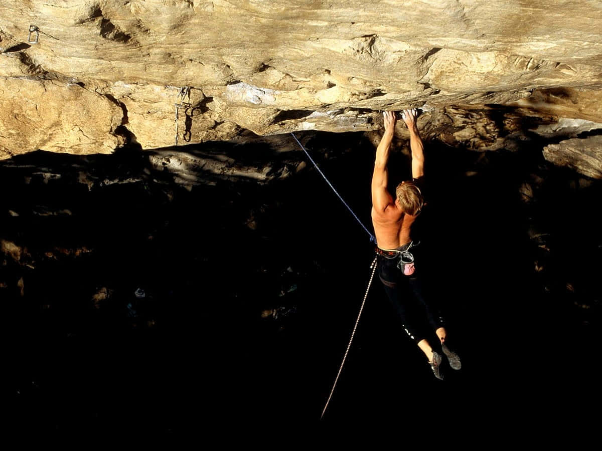 rock climbing, rugged overhang, dark cave, SD Desktop Wallpaper