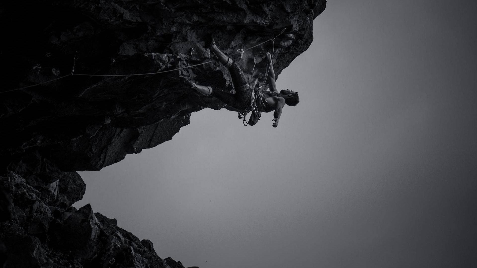 man rock climbing, rocky overhang, muted sky, Full HD Desktop Wallpaper