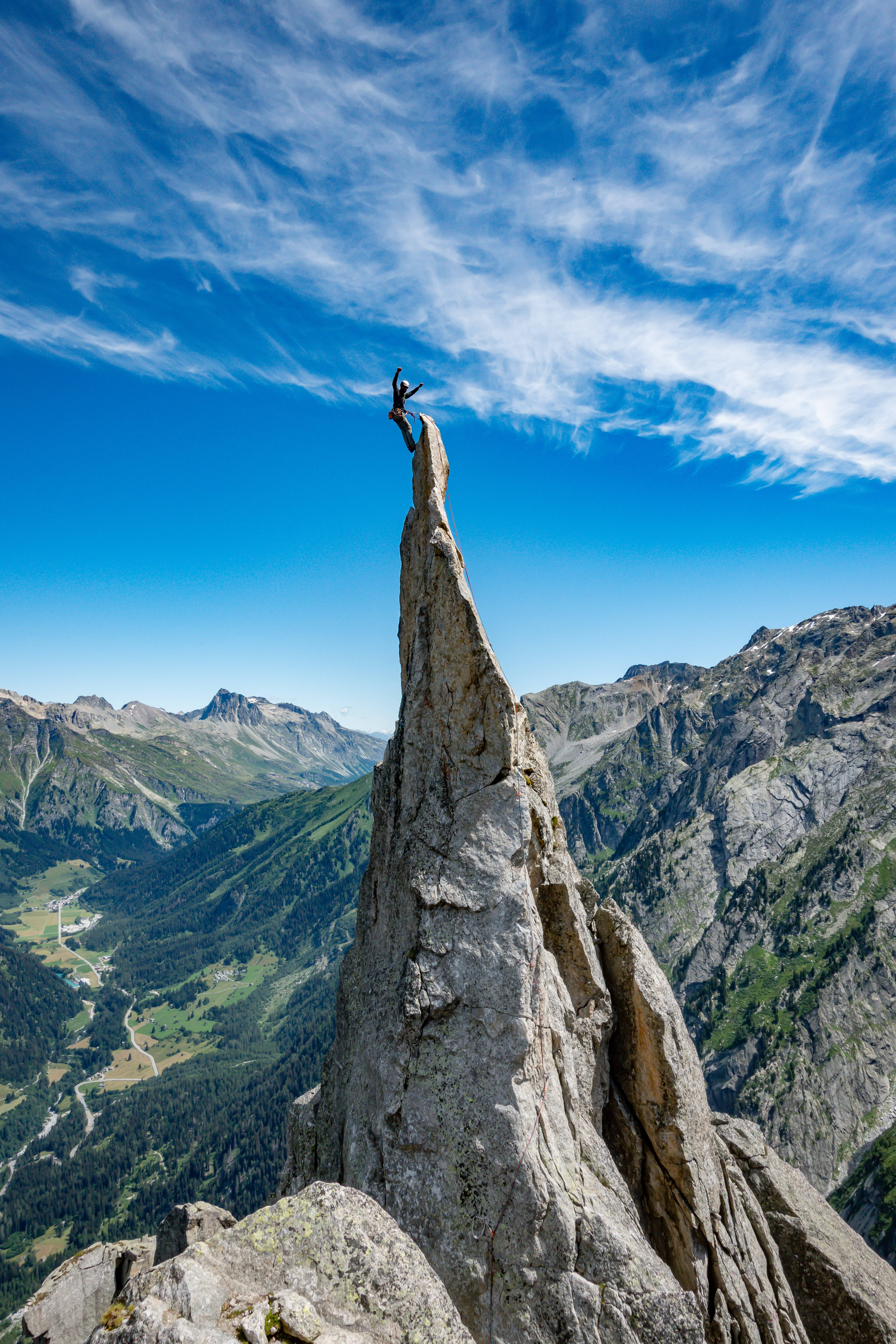 rock climbing, jagged mountain peak, vast blue sky, 5K Phone Wallpaper