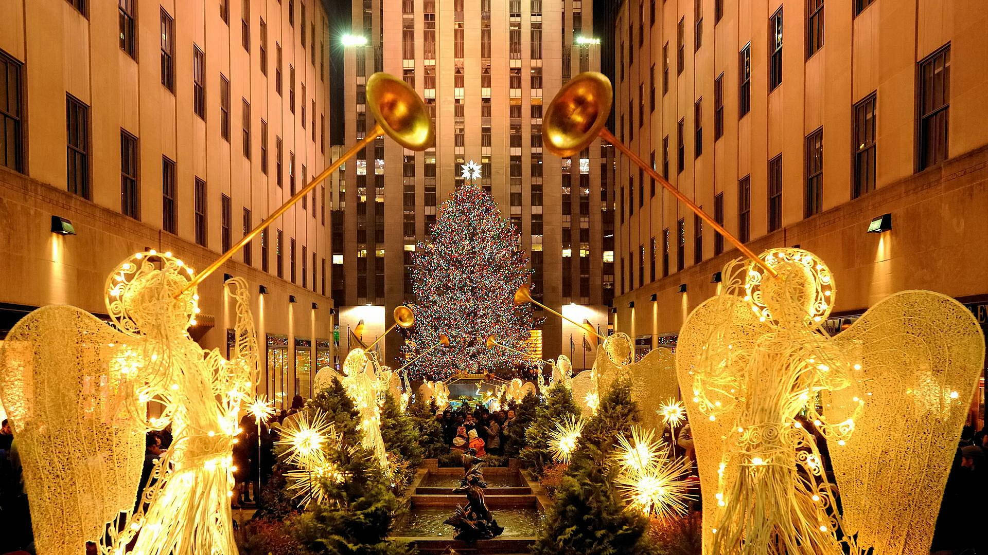 Rockefeller Center, glowing angel statues, towering Christmas tree, Full HD Desktop Wallpaper