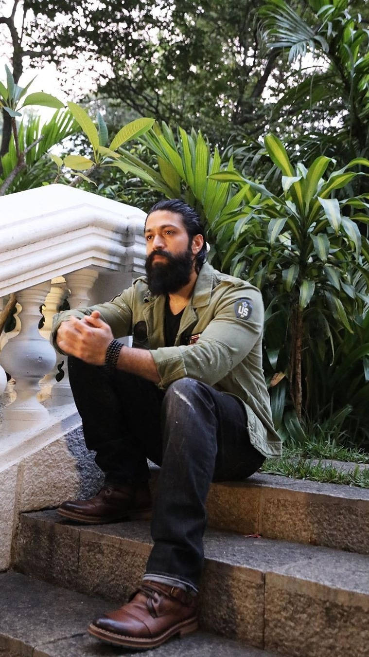 Rocking Star Yash, olive jacket, stone steps, HD Phone Wallpaper