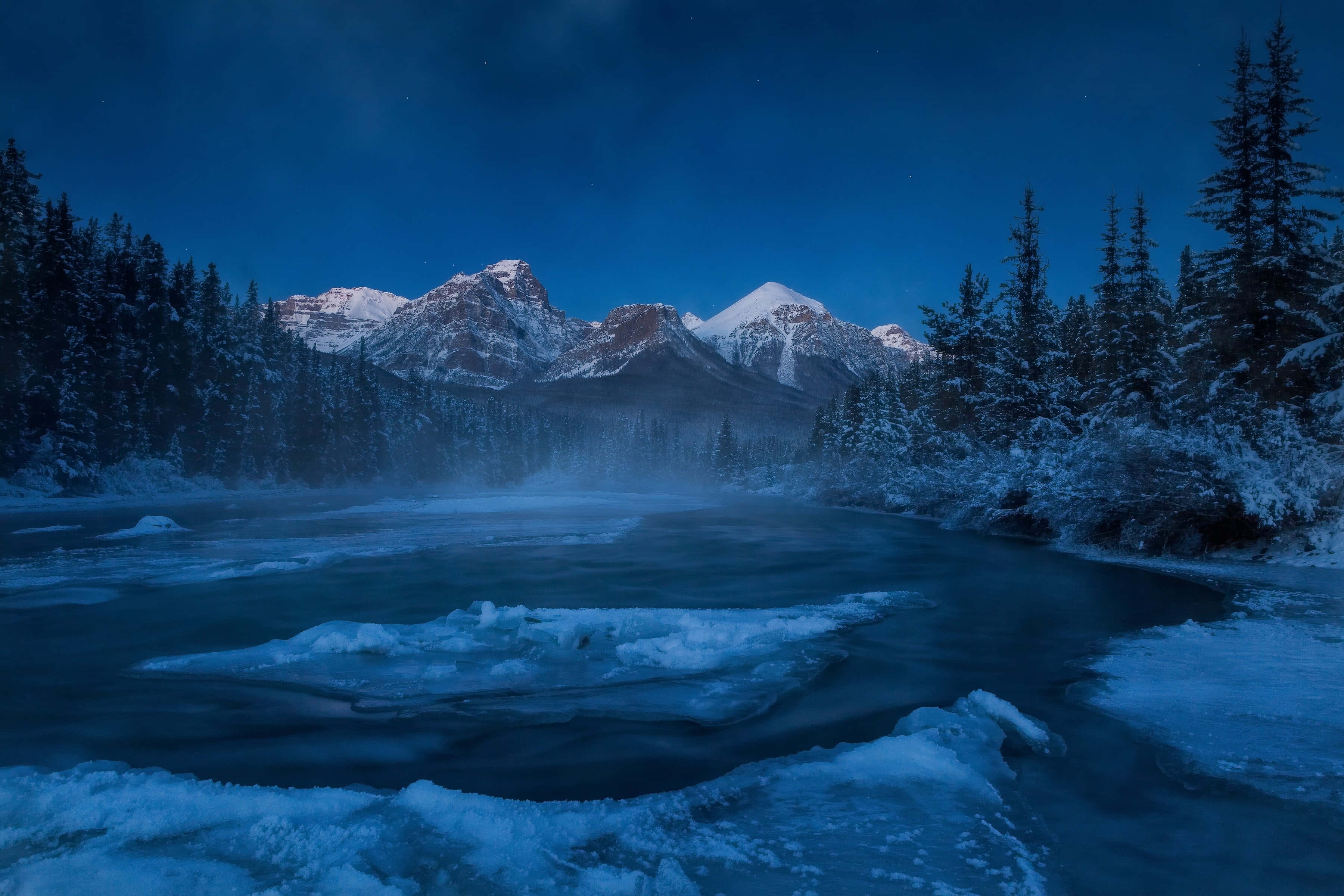 Rocky Mountains, starlit sky, frozen river, 2K Desktop Wallpaper