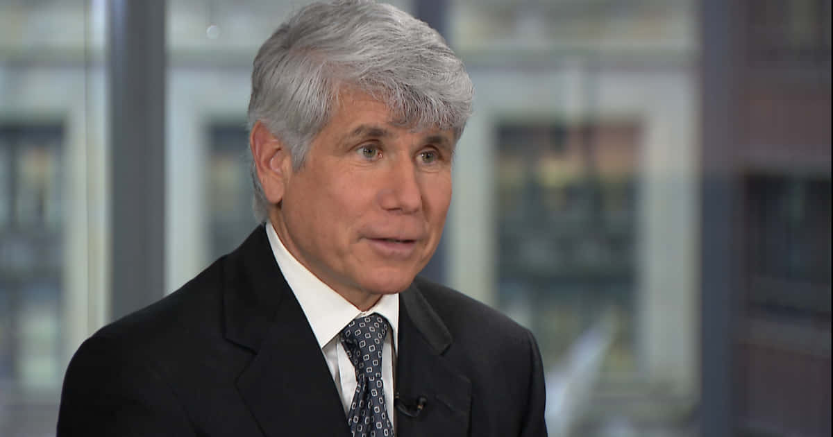 Rod Blagojevich, talk show pundit, modern office setting, SD Desktop Wallpaper