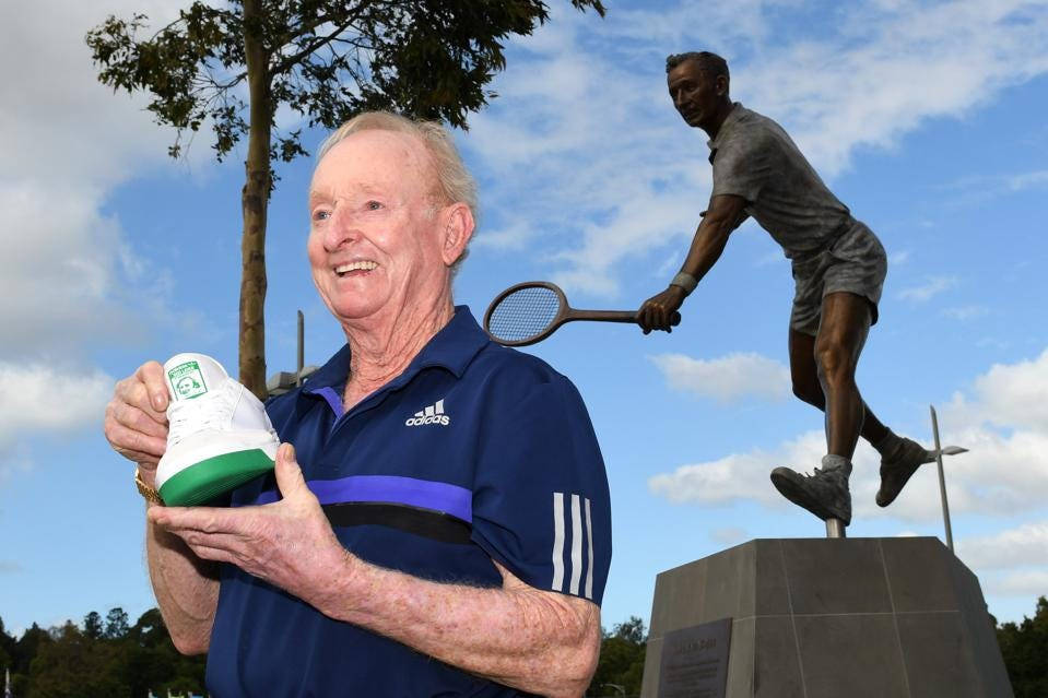 Rod Laver, bronze statue of a tennis player mid-swing, blue Adidas polo, SD Desktop Wallpaper