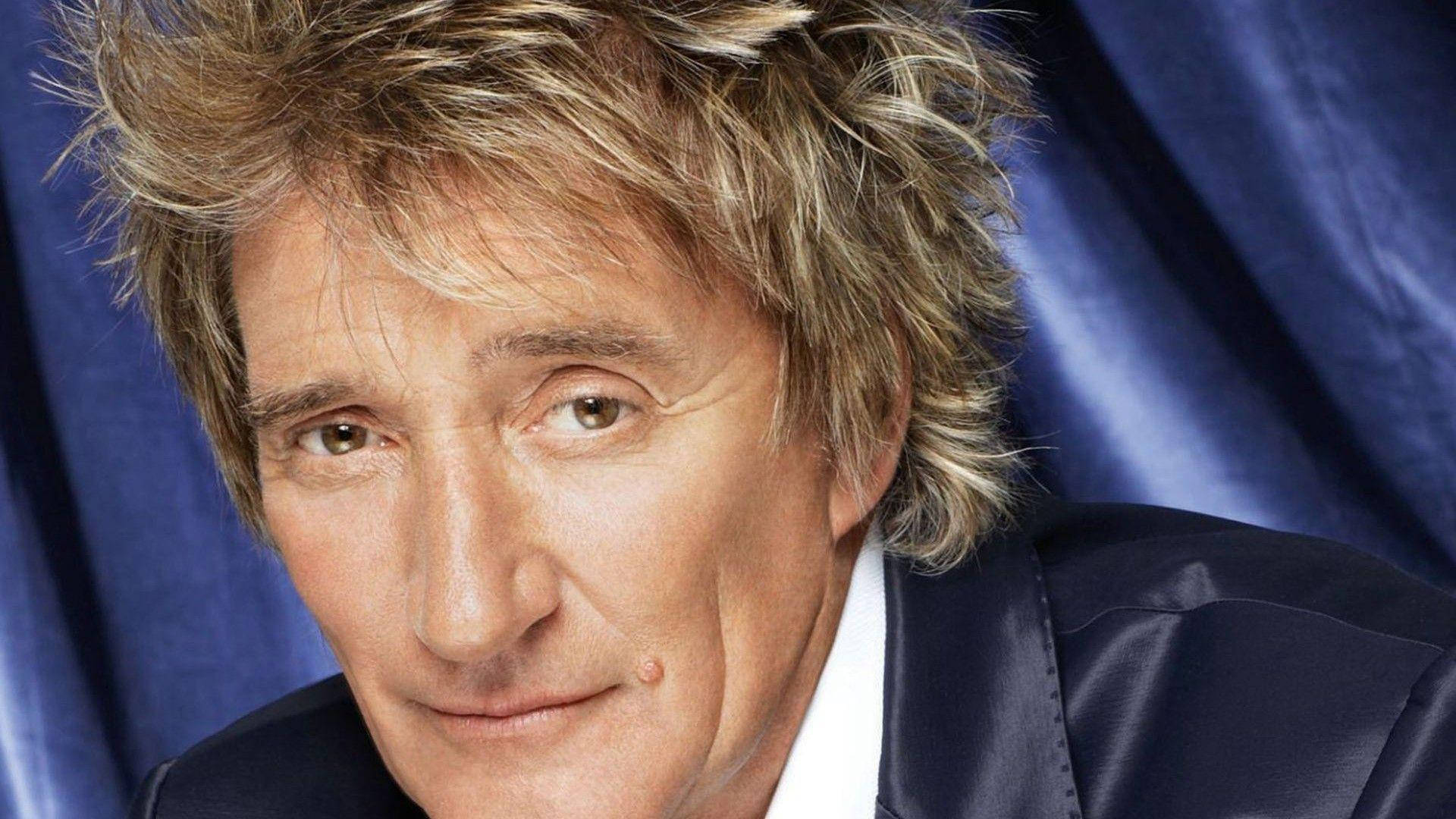 Rod Stewart, tousled blonde hair, dark suit, Full HD Desktop Wallpaper