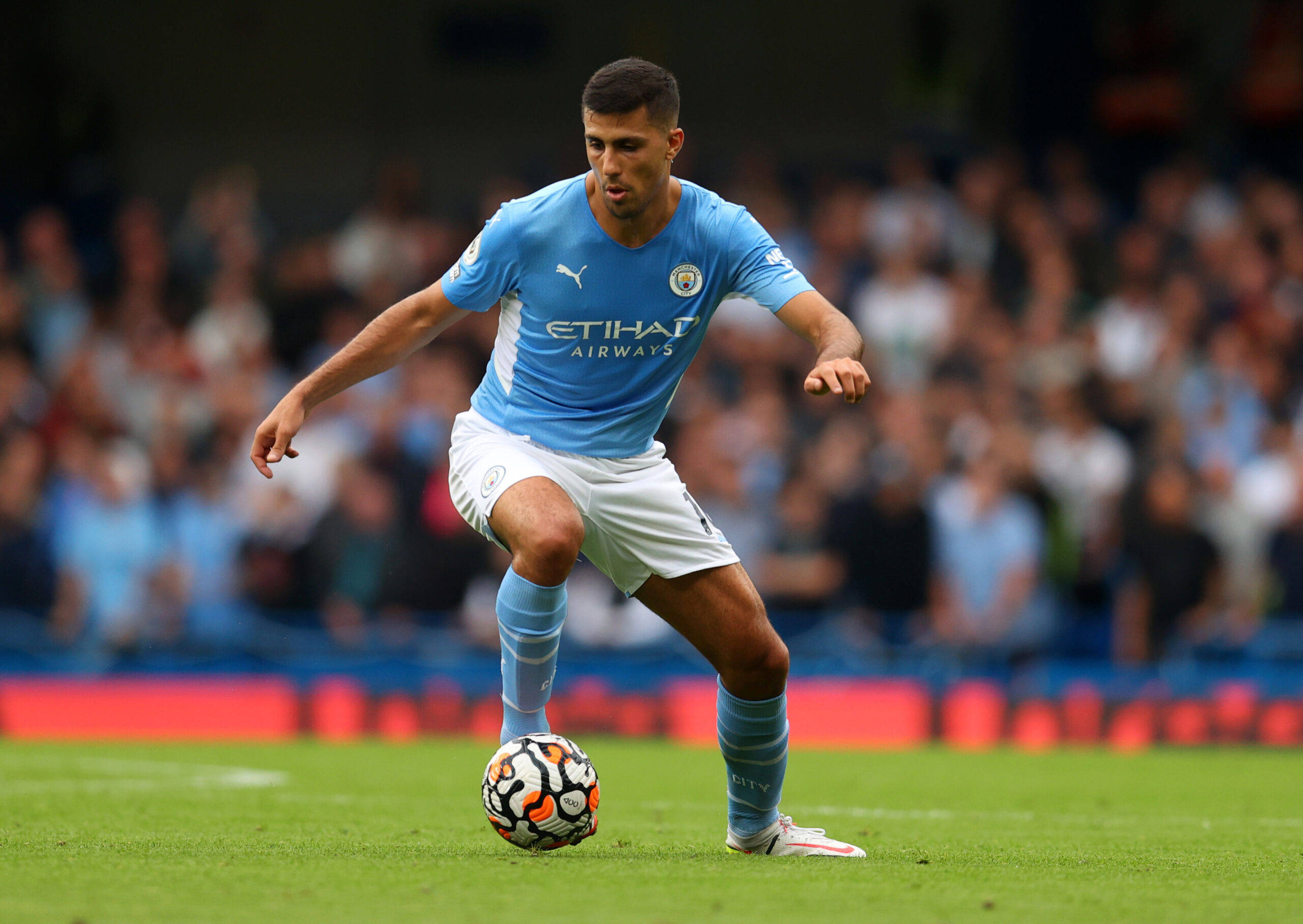 Rodri, light blue jersey, black and orange ball, 2K Desktop Wallpaper