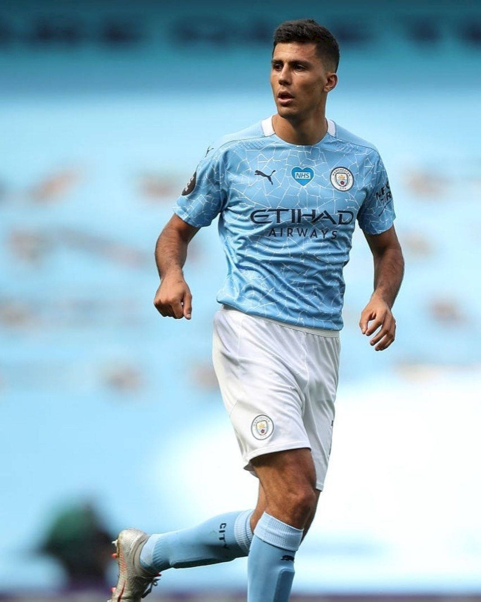 Rodrigo Hernández Cascante, light blue Manchester City jersey, bright stadium field, Full HD Phone Wallpaper