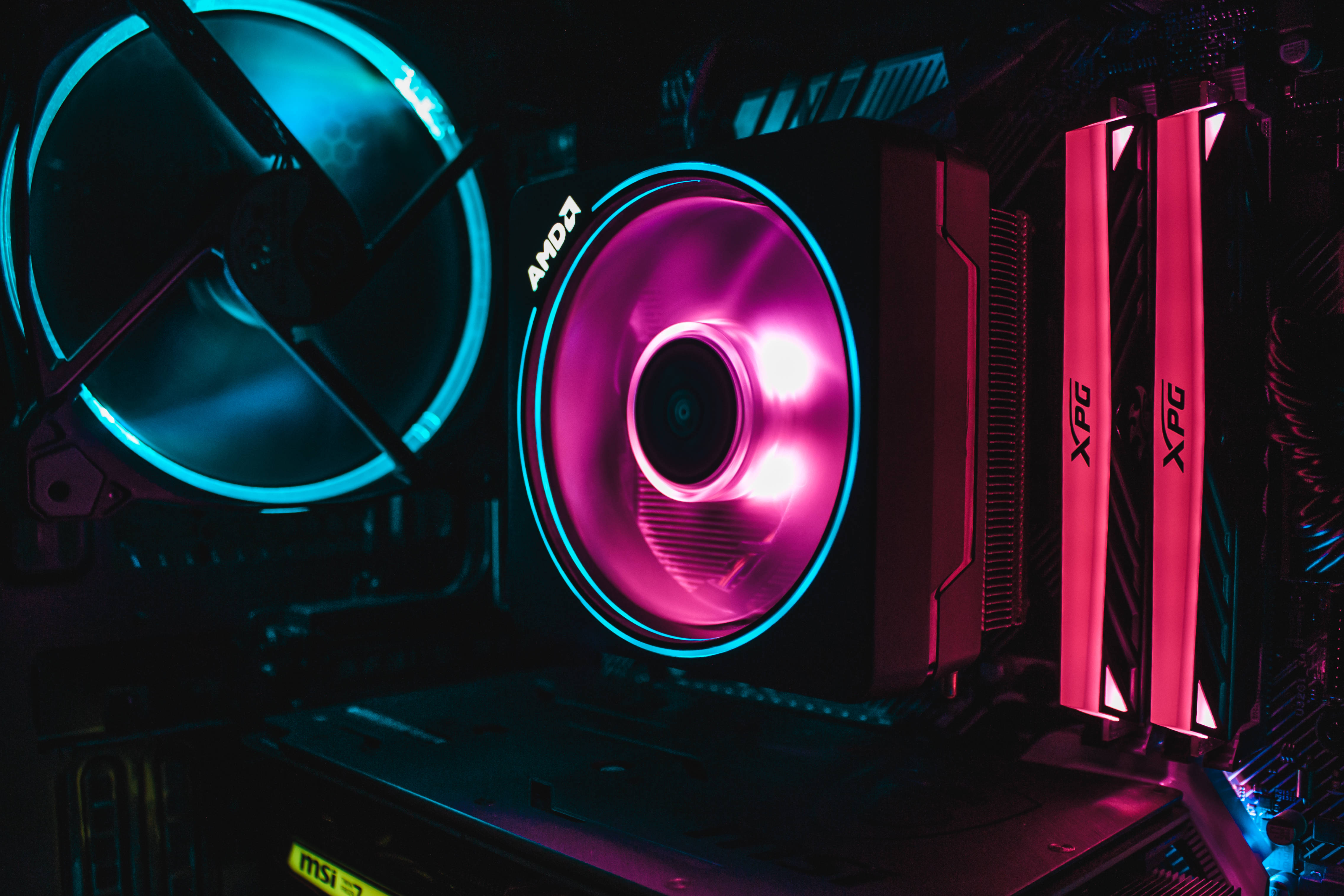 MSI Gaming Laptop, glowing RGB fans, RAM sticks, 4K Desktop Wallpaper