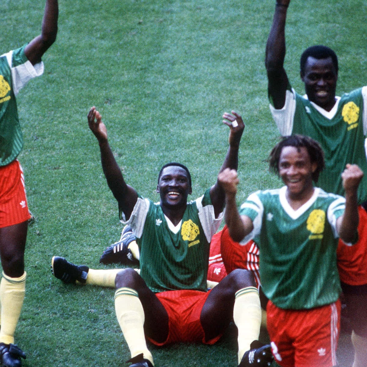 Roger Milla, green and red uniforms, vibrant green field, SD Desktop Wallpaper