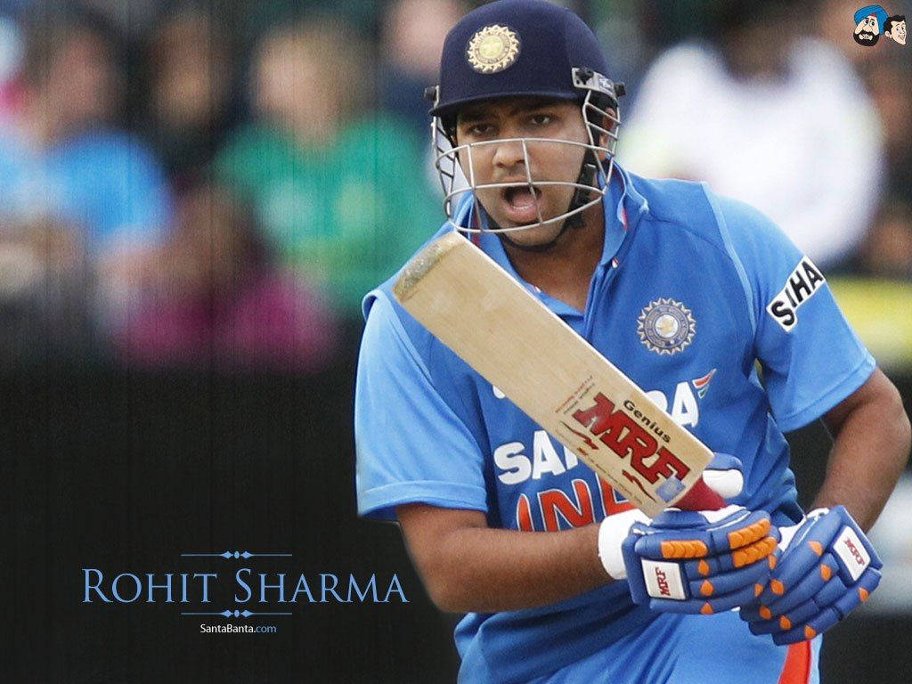 Rohit Sharma, blue Indian jersey, bat mid-swing, SD Desktop Wallpaper