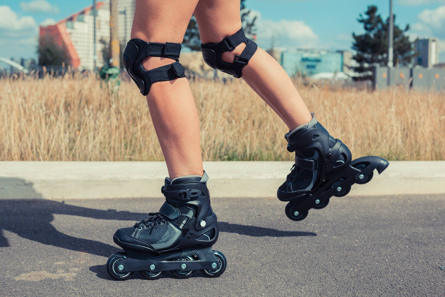 black inline skates, paved path, dry grass, HD Desktop Wallpaper