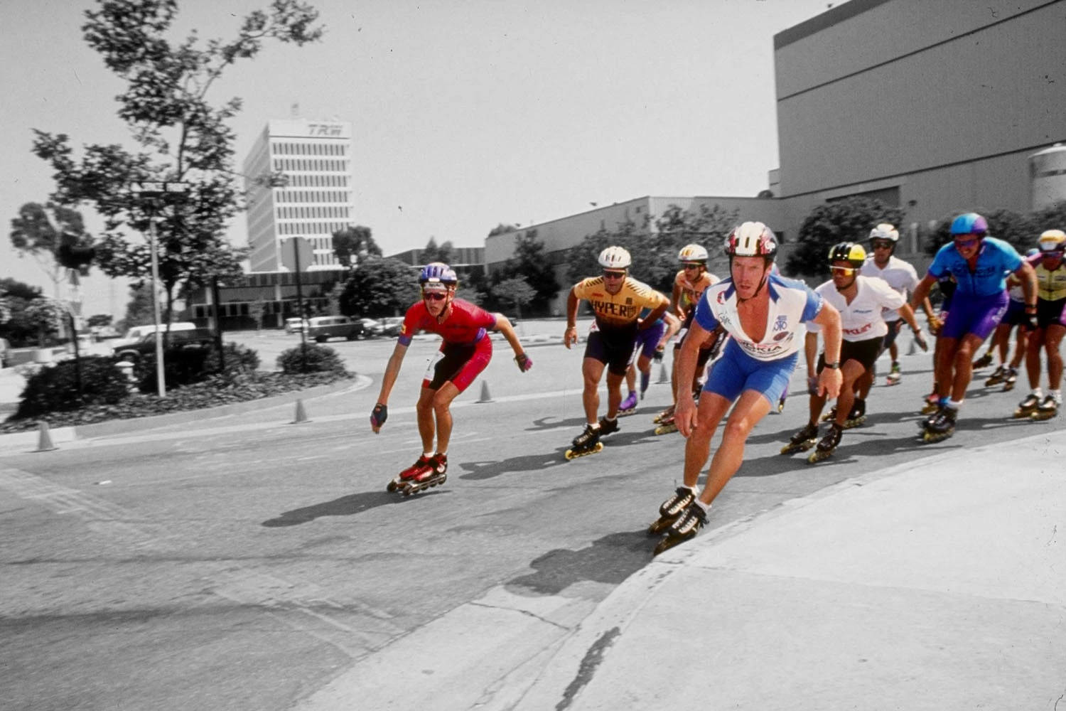 colored black and white rollerblading, paved urban street, buildings, HD Desktop Wallpaper