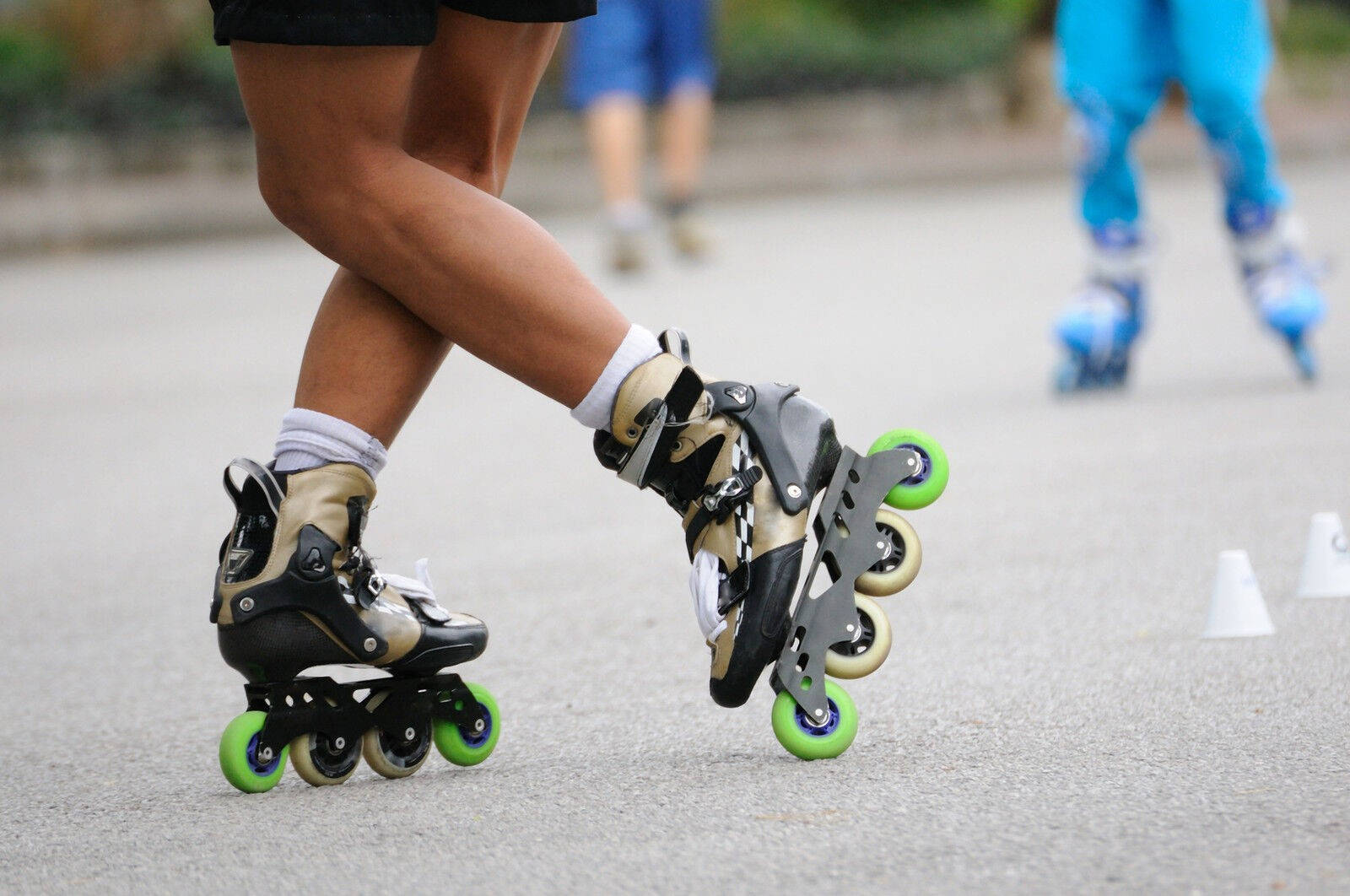 inline skates, bright green wheels, pavement, HD Desktop Wallpaper