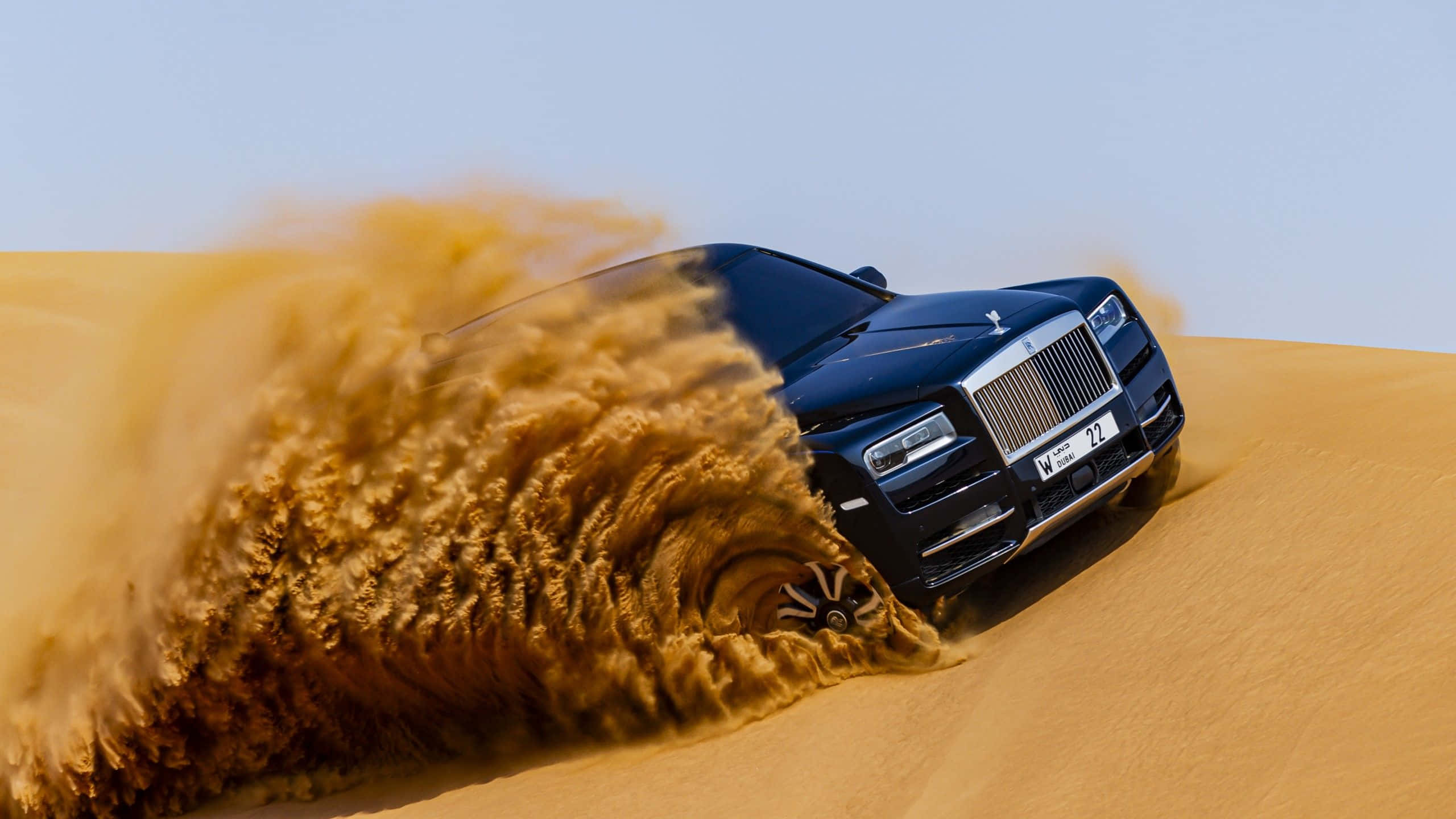Rolls Royce Cullinan, sleek black, golden desert dunes, 2K Desktop Wallpaper