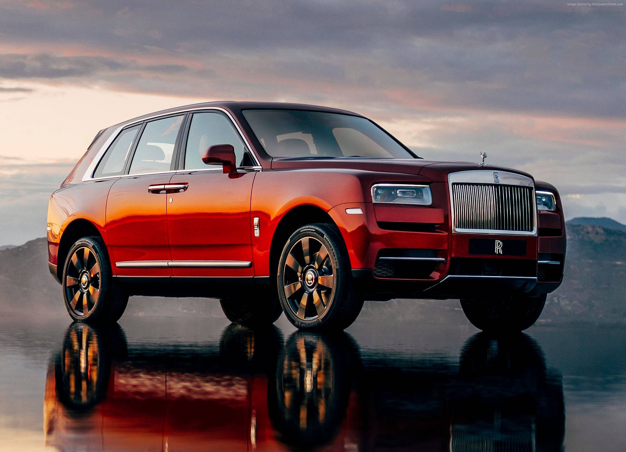 Rolls Royce Cullinan, glossy red, wet pavement, 2K Desktop Wallpaper