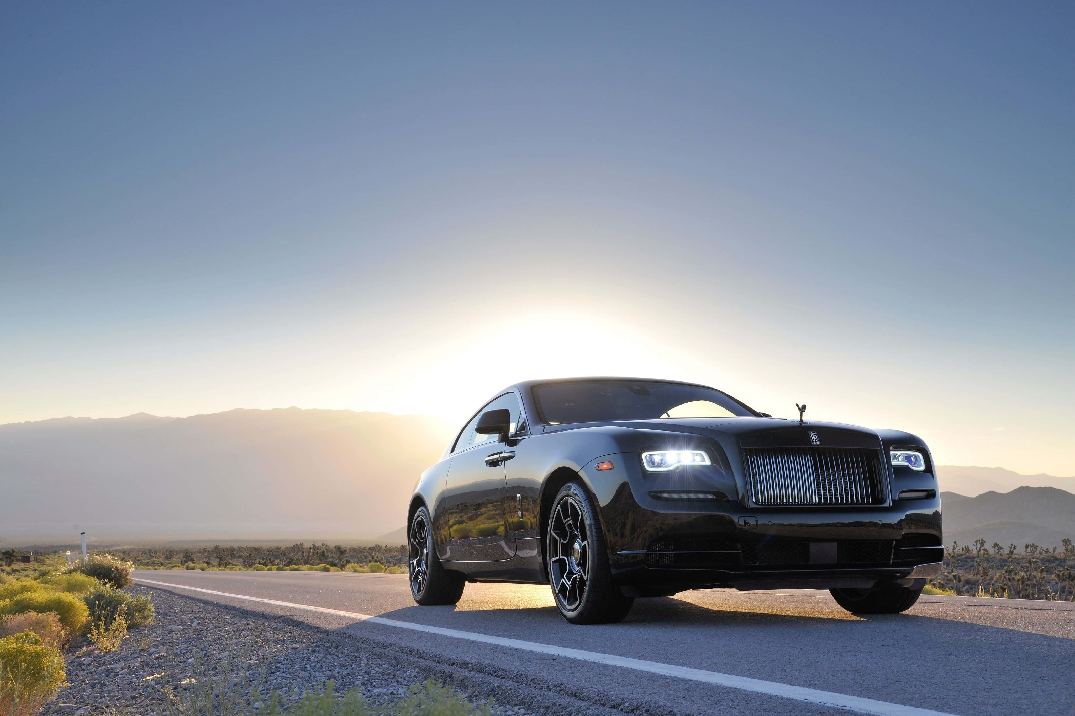Rolls Royce Ghost, sleek black, desert highway, 4K Desktop Wallpaper