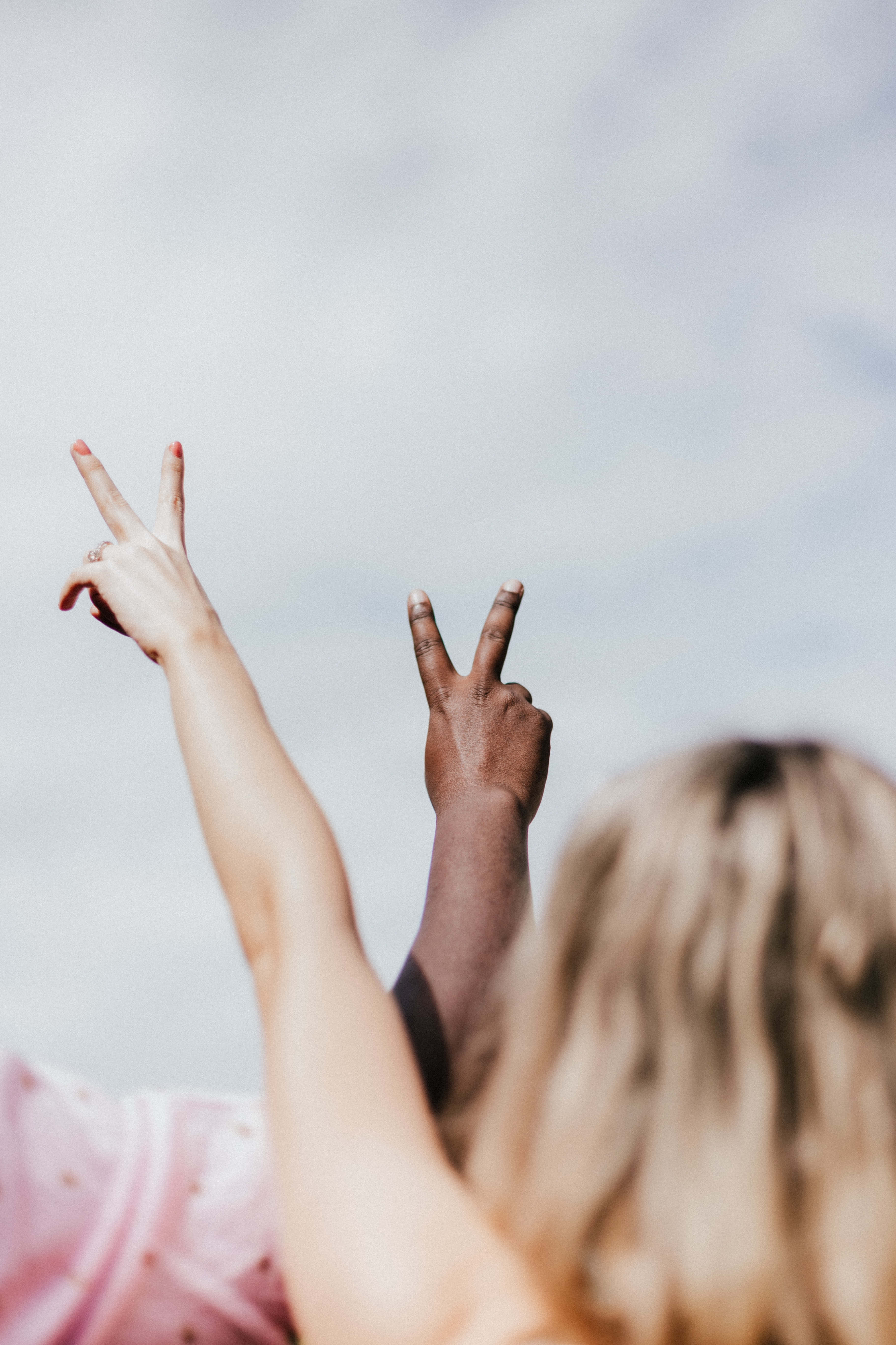 interracial couple, peace sign, clear skies, 5K Phone Wallpaper