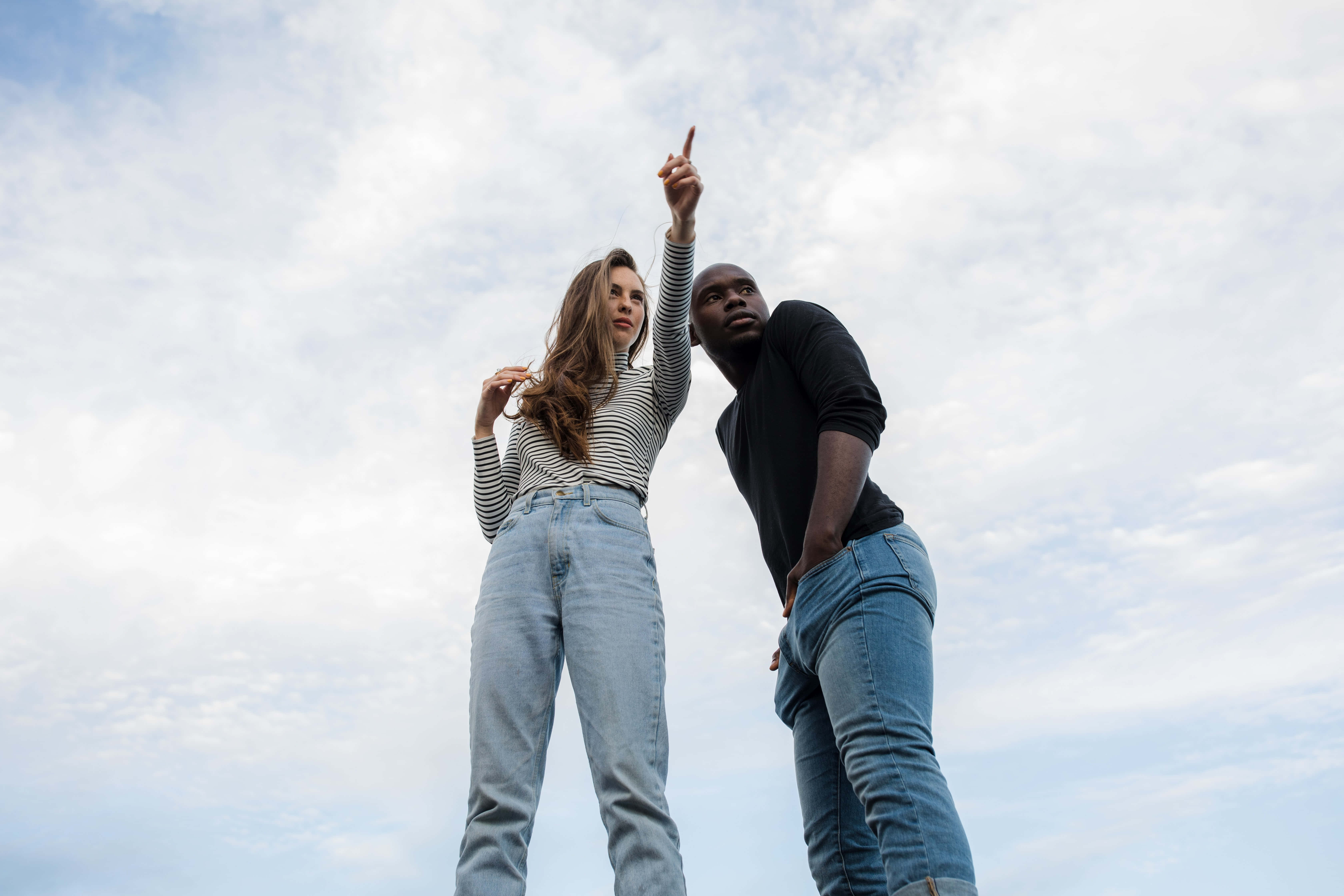 interracial couple, low-angle shot, man and woman, 5K Desktop Wallpaper