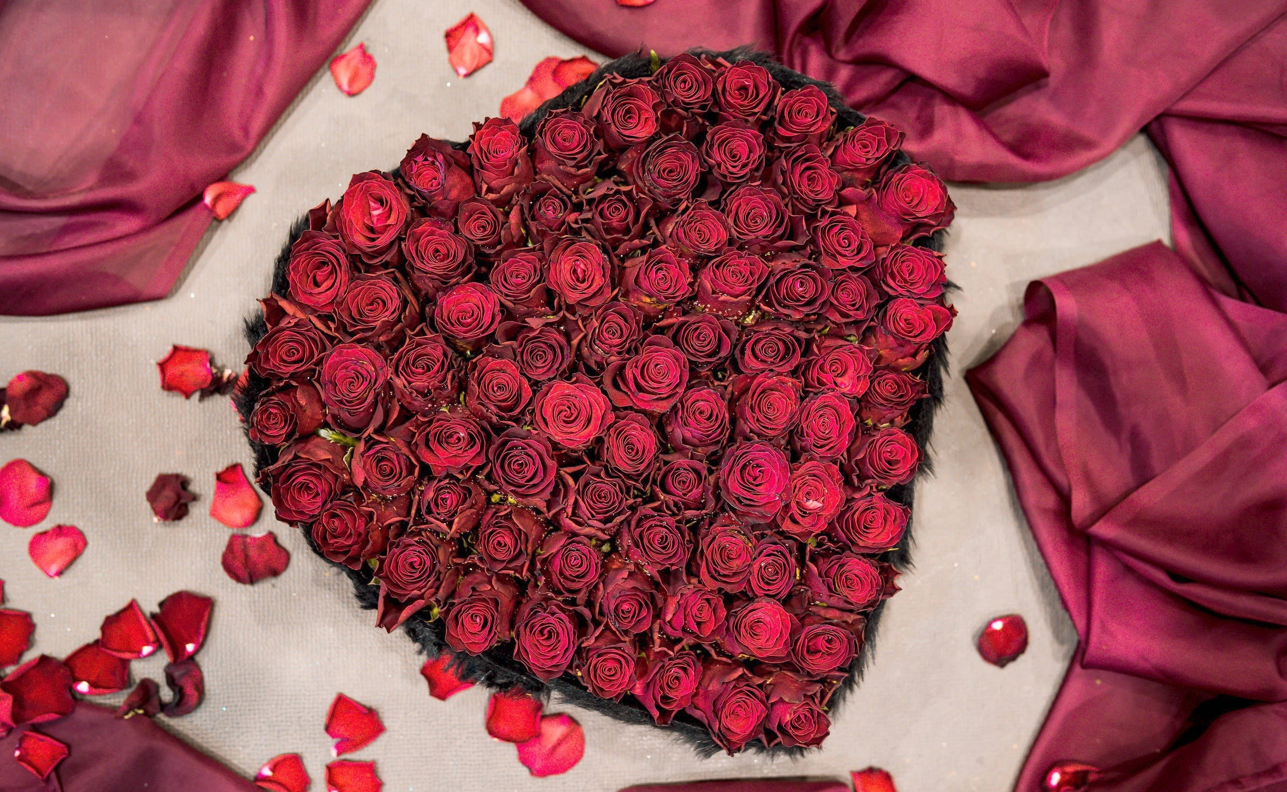 large heart shaped romantic rose, deep red roses, burgundy fabric, 2K Desktop Wallpaper