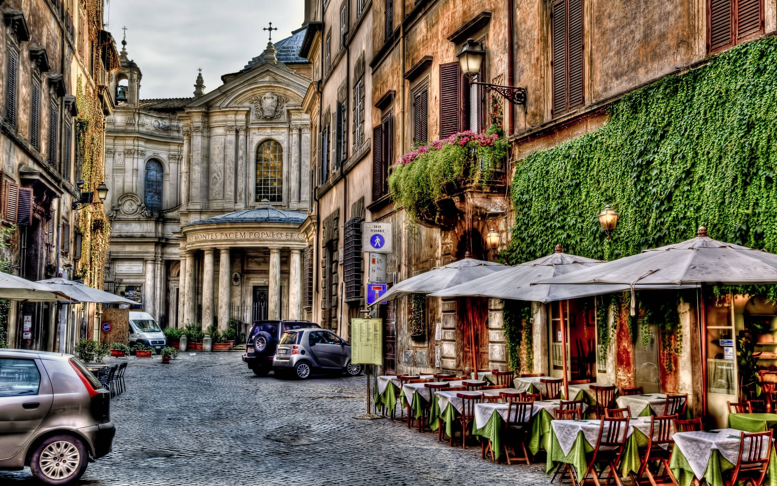 Rome, cobblestone street, ivy-covered buildings, 2K Desktop Wallpaper