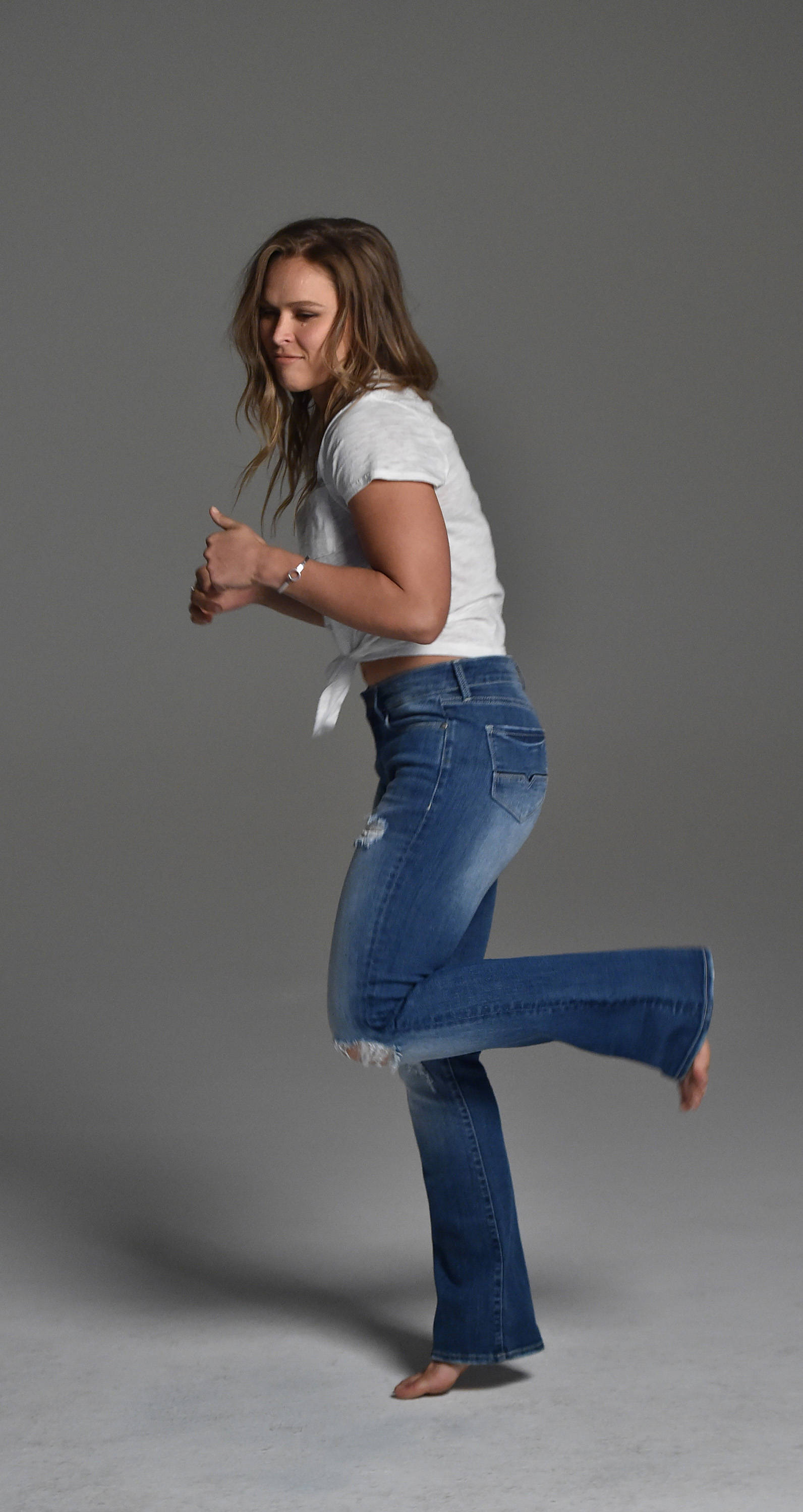 Ronda Rousey, ripped jeans, white top, 2K Phone Wallpaper