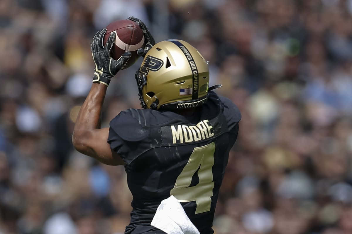 Rondale Moore, Purdue football player, black and gold gear, SD Desktop Wallpaper