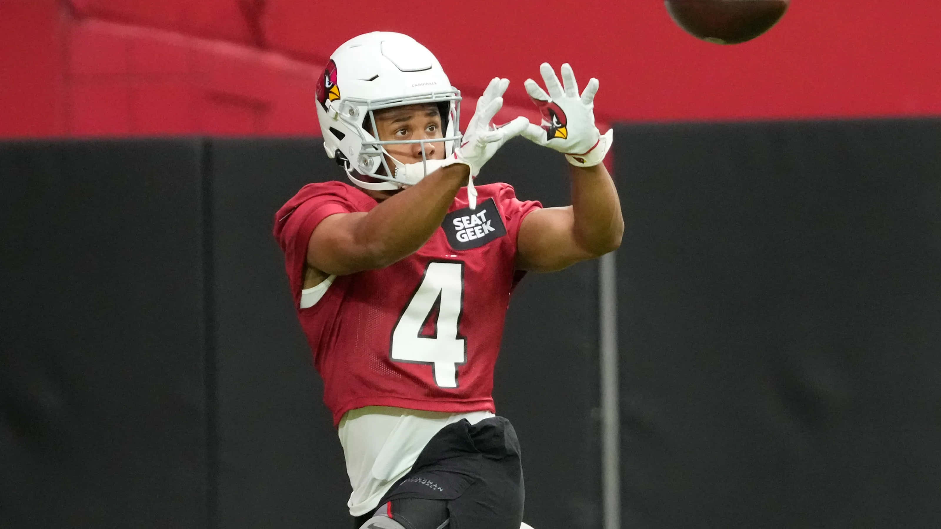Rondale Moore, red and white gear, red and black wall, 2K Desktop Wallpaper