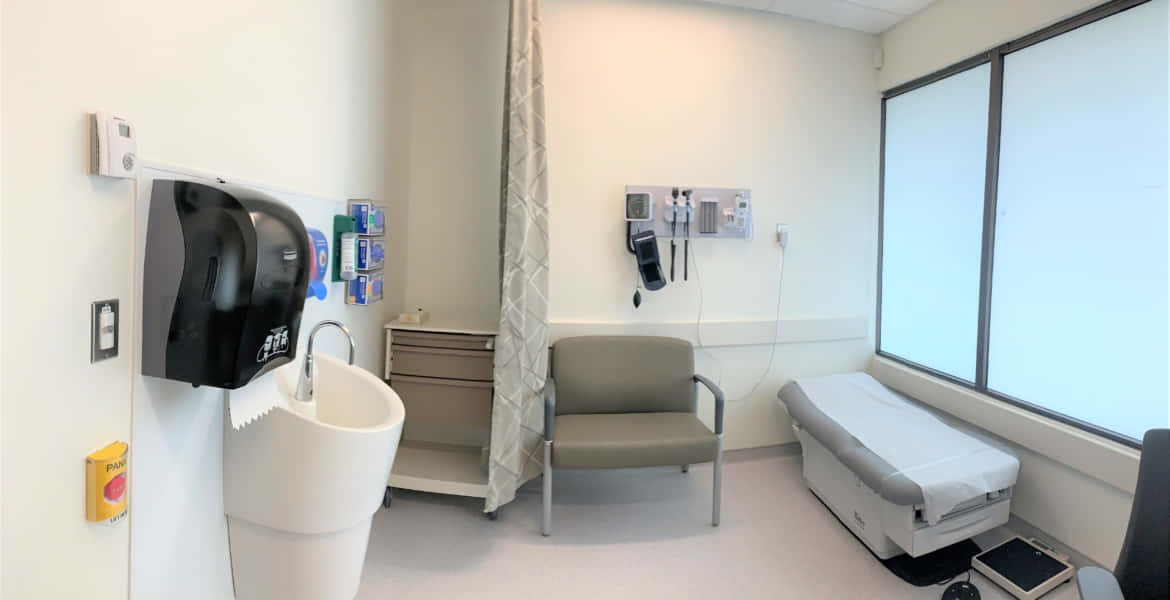 Ambulatory Rehab, modern medical exam room, patient bed chair, SD Desktop Wallpaper
