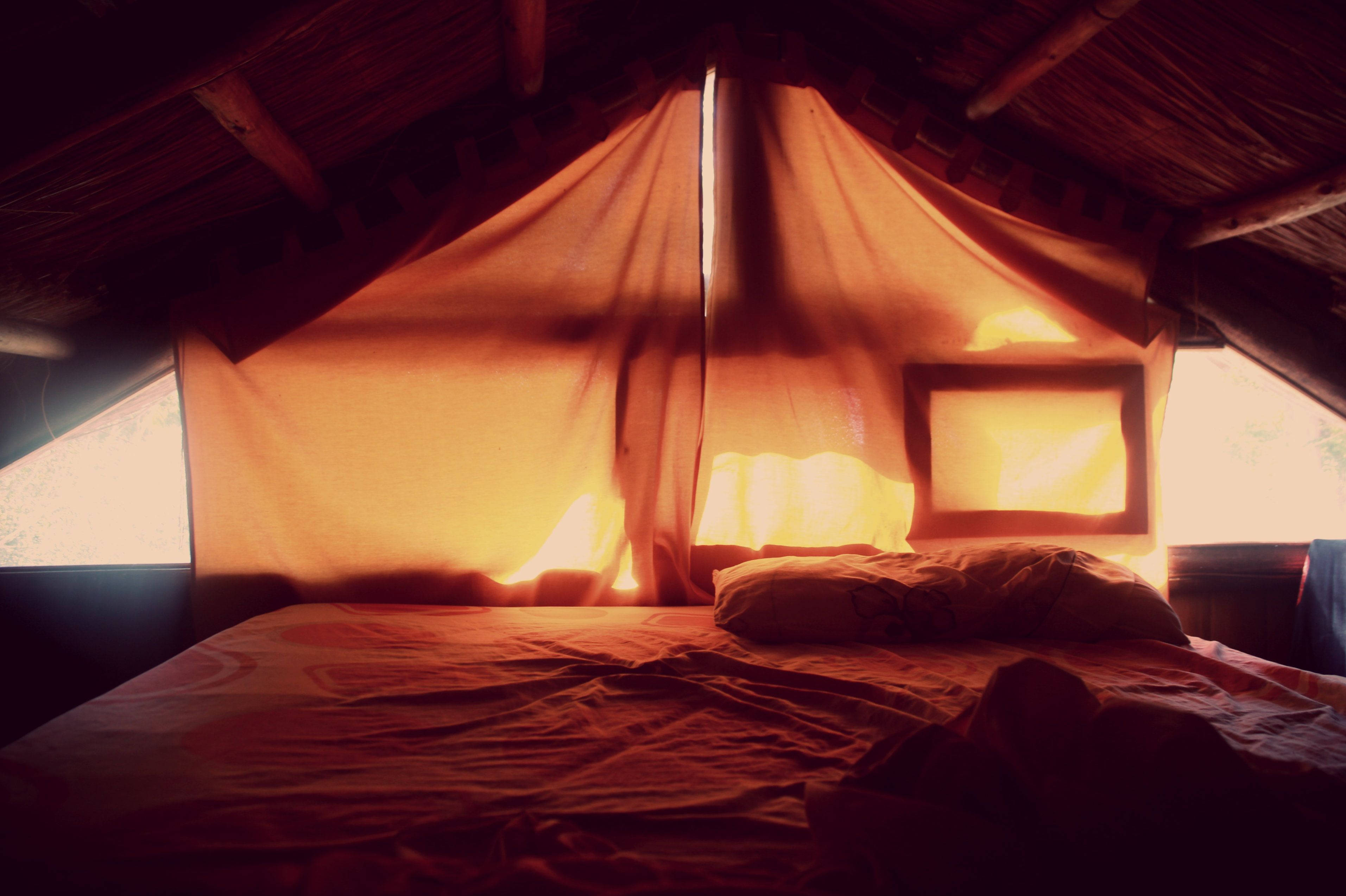 attic room, warm golden light, thatched roof, 2K Desktop Wallpaper