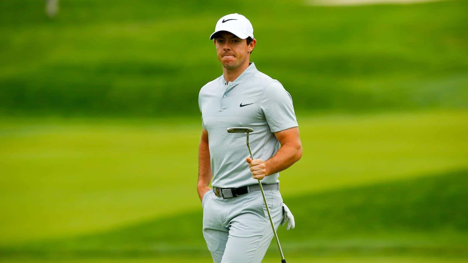 Rory McIlroy, putter, vibrant green fairway, HD Desktop Wallpaper