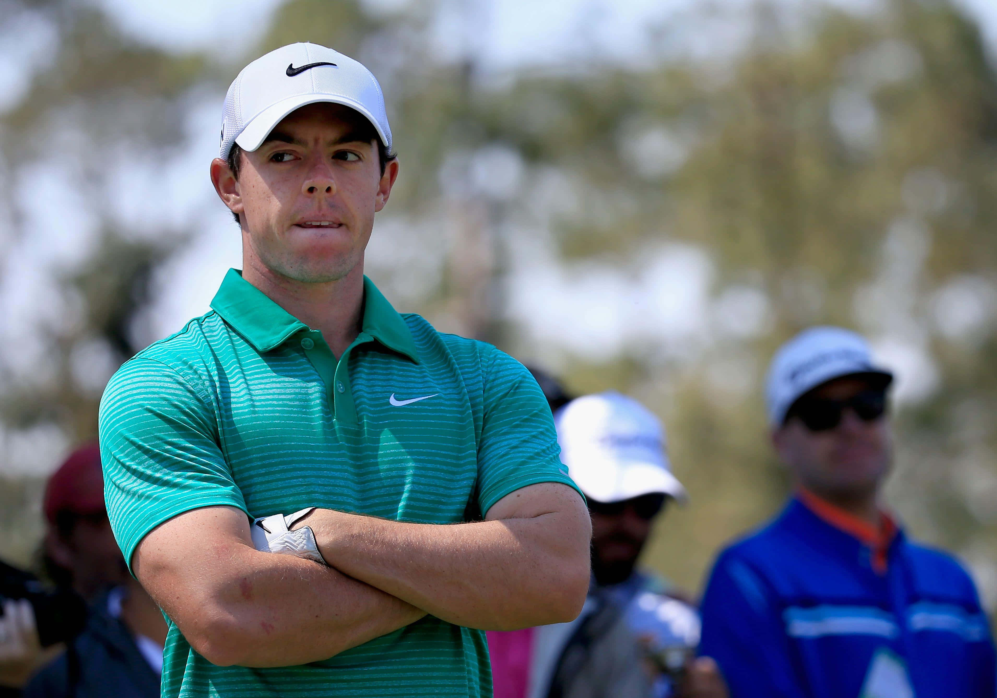 Rory Mcilroy, green striped polo, white cap, 2K Desktop Wallpaper