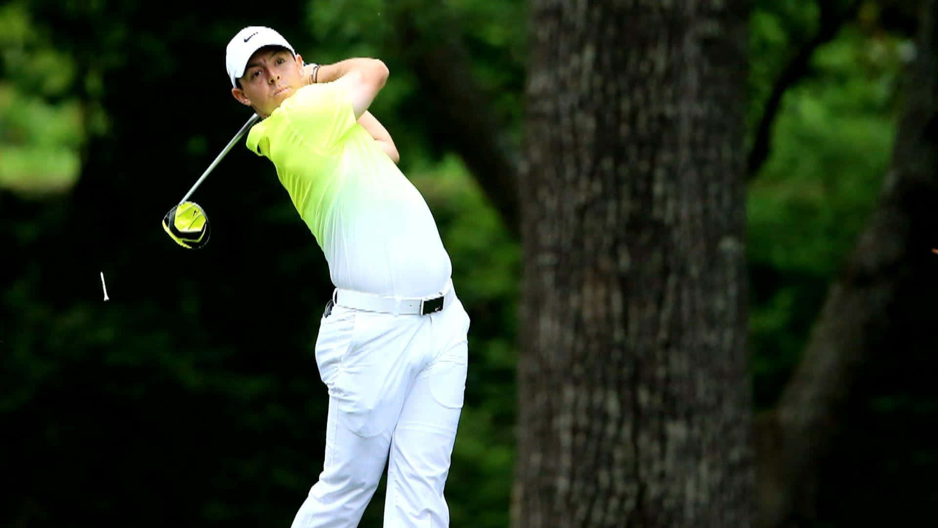 Rory Mcilroy, bright yellow shirt, lush green trees, Full HD Desktop Wallpaper