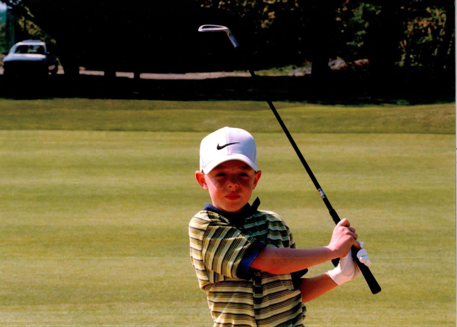 Rory Mcilroy, striped shirt, white cap, HD Desktop Wallpaper